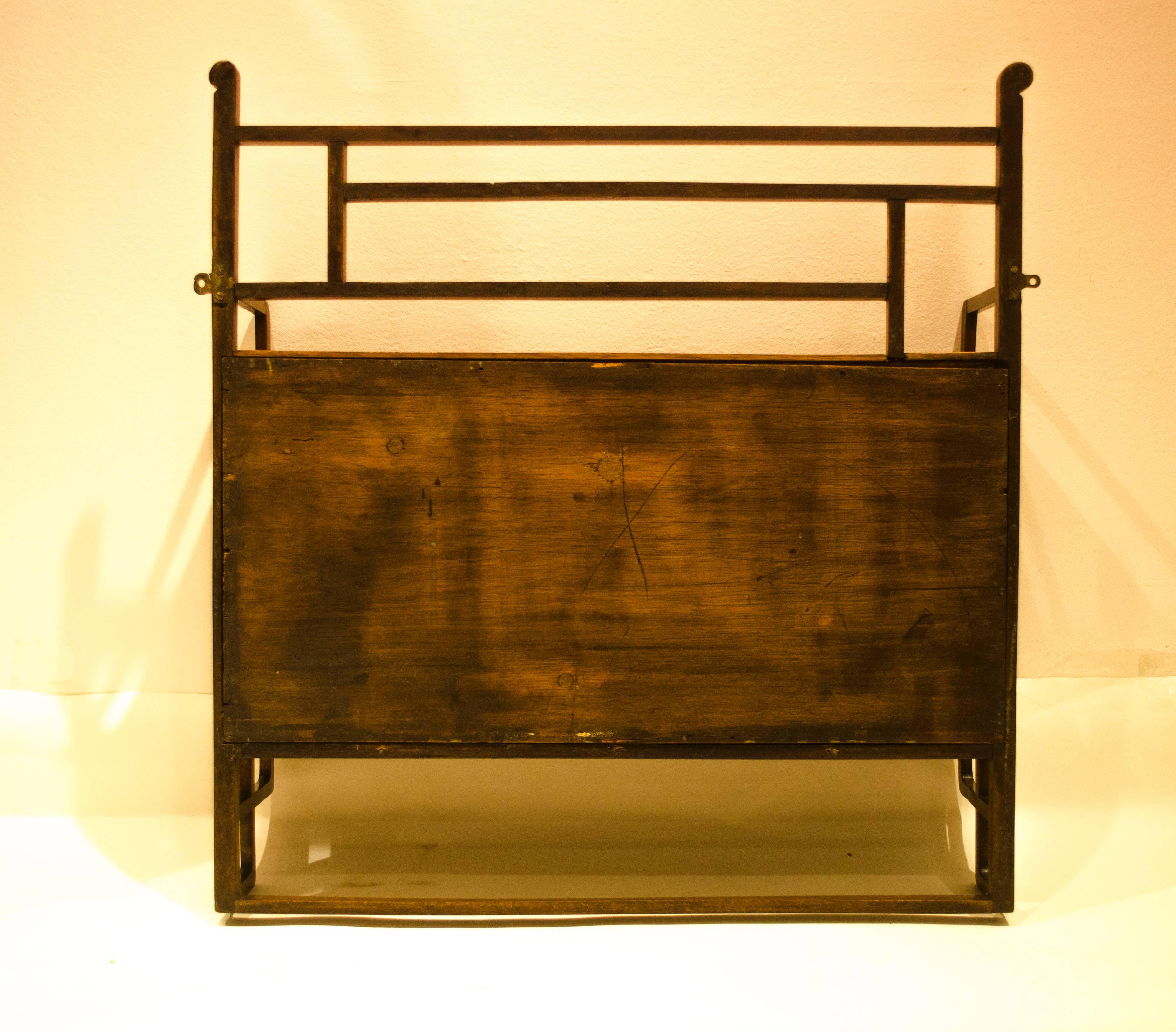 An Anglo-Japanese set of mahogany wall shelves in the manner of E. W. Godwin.

  