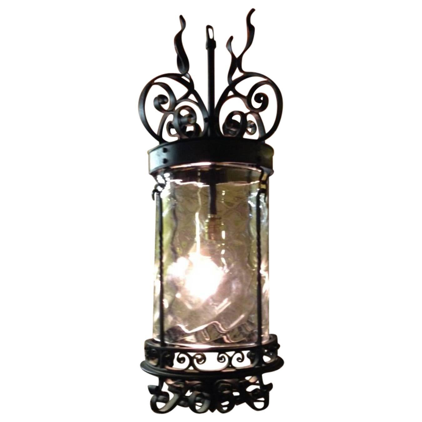 An Arts & Crafts Hand Wrought Iron Lantern with Flaming Tendrils & Dappled Shade For Sale