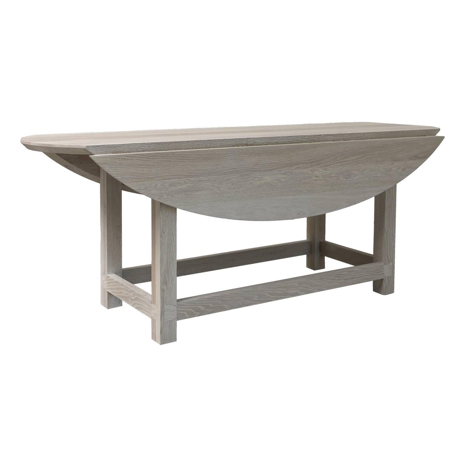 am designs dining table or console, in bleached massive oak. Gate leg model.