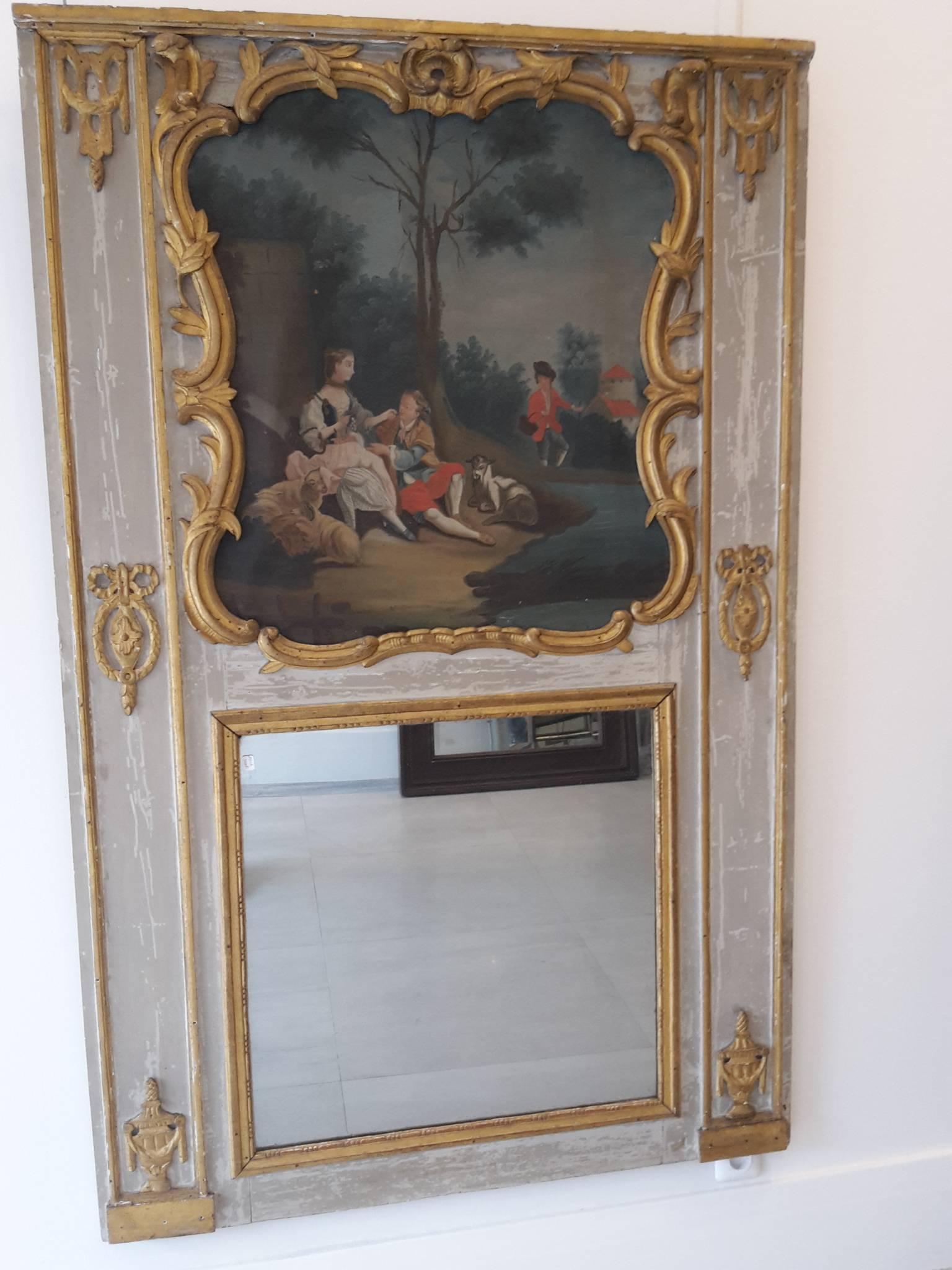 Regence trumeau with a oil painting, grey used painted wood.
18th century period, gilt frame.
All carved giltwood.
Mercury panel glass.
 