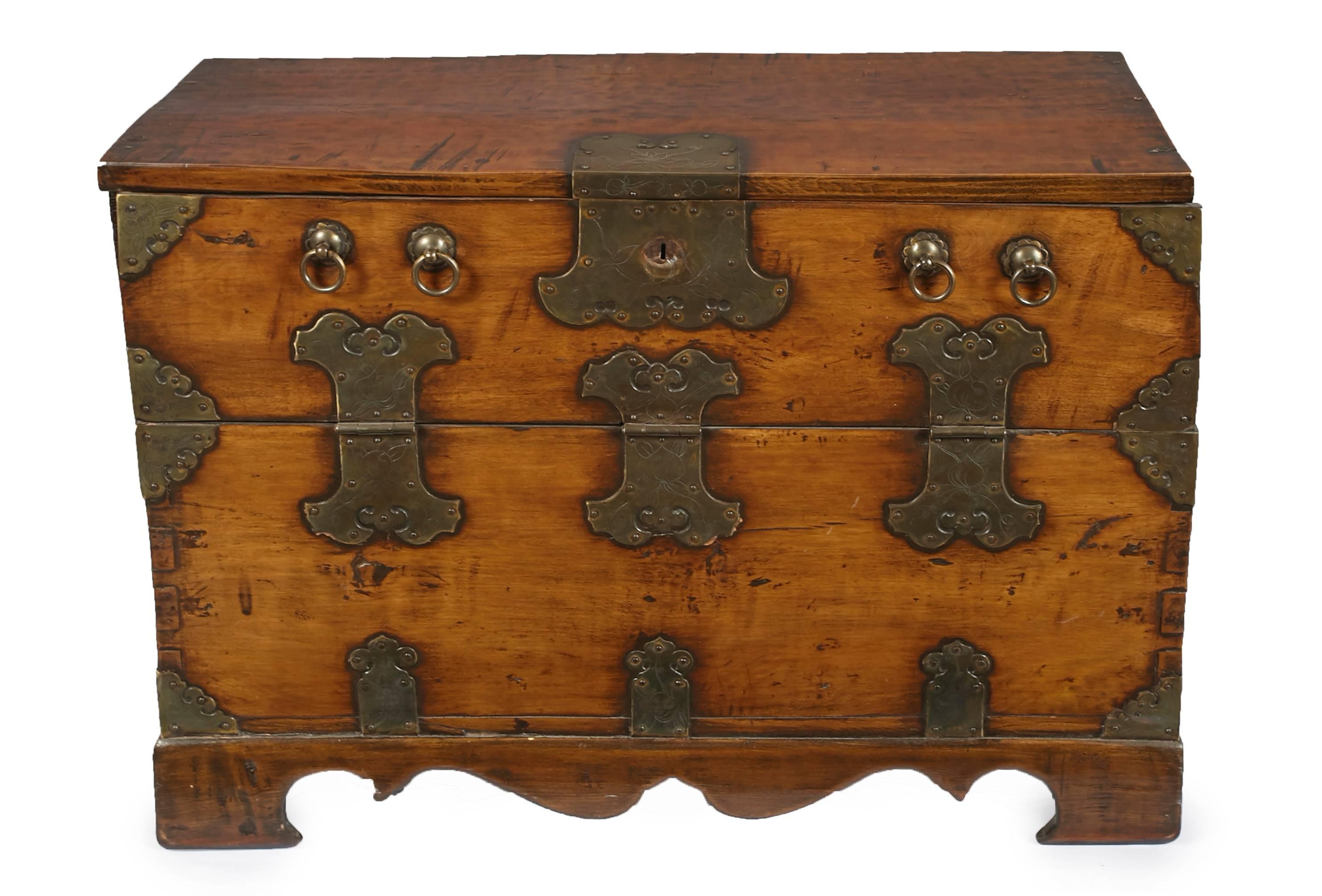 Remarkable chest from the mid-late 19th century. Hand hewn with brass details.
