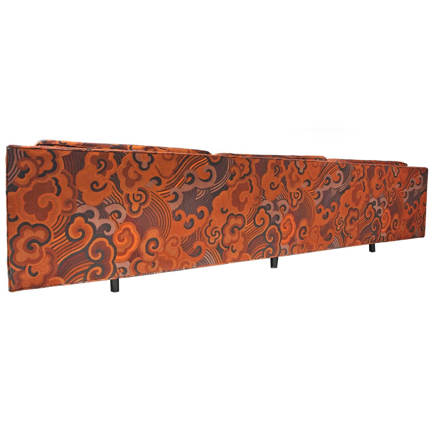 This phenomenal Mid-Century Modern Harvey Probber Tuxedo sofa, is upholstered in Jack Lenor Larson fabric. This upholstery is one of Jack Lenor Larsen's signature fabrics. The design was inspired by a Chinese robe and Ming Dynasty embroideries in