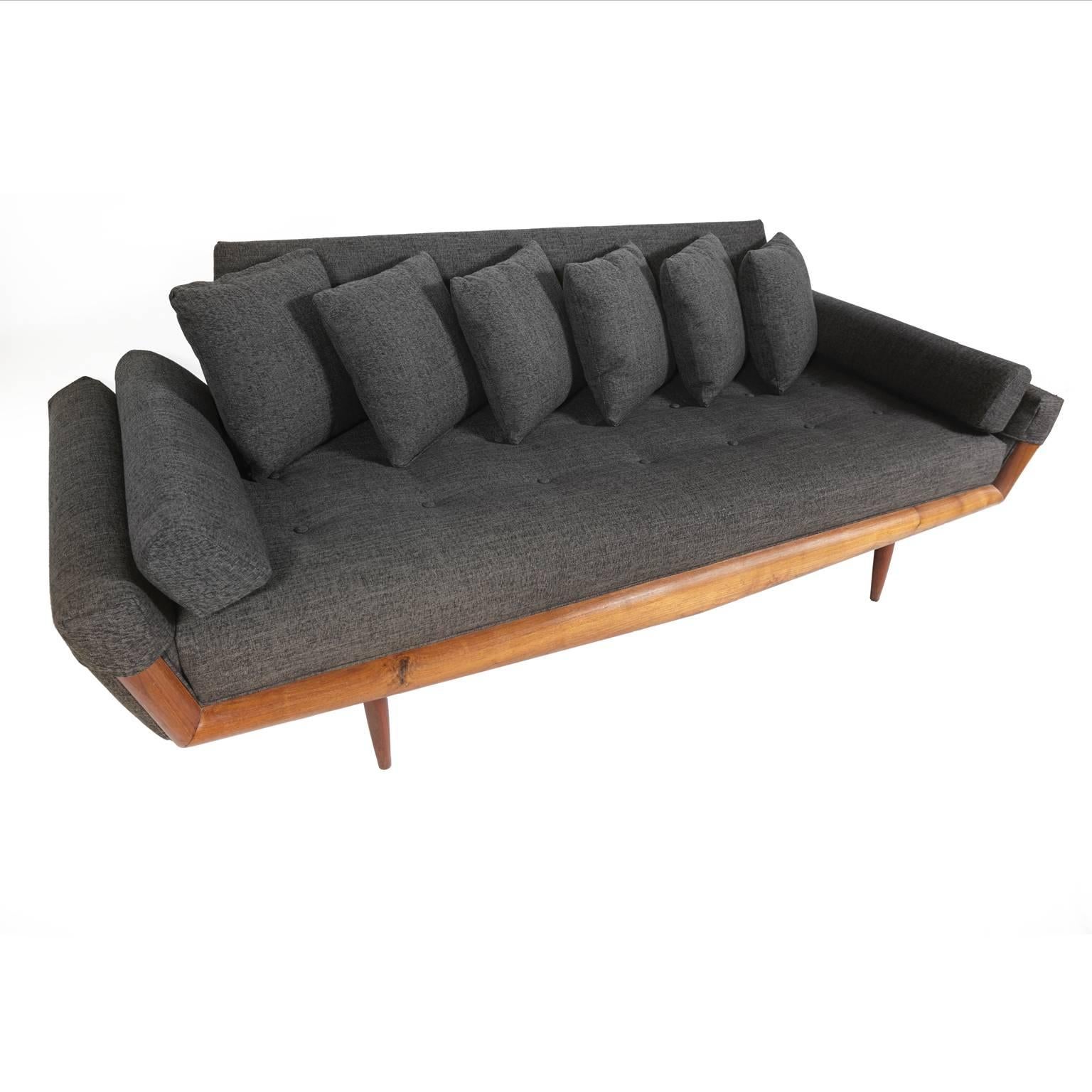 Adrian Pearsall Mid-Century Modern sofa with walnut frame and newly upholstered in charcoal grey fabric. 
Sofa has six pillows but can be used with fewer pillows or plain.
    