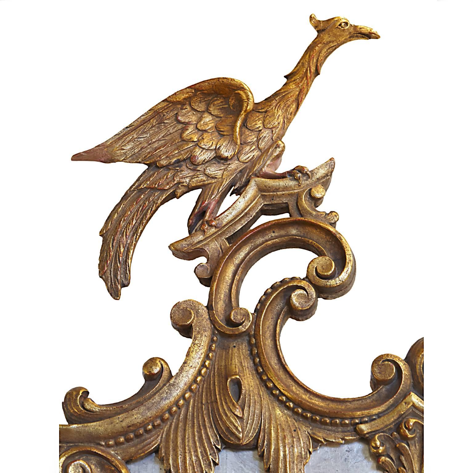 Unknown Pair of Opposing Giltwood Carved Eagle Mirrors For Sale