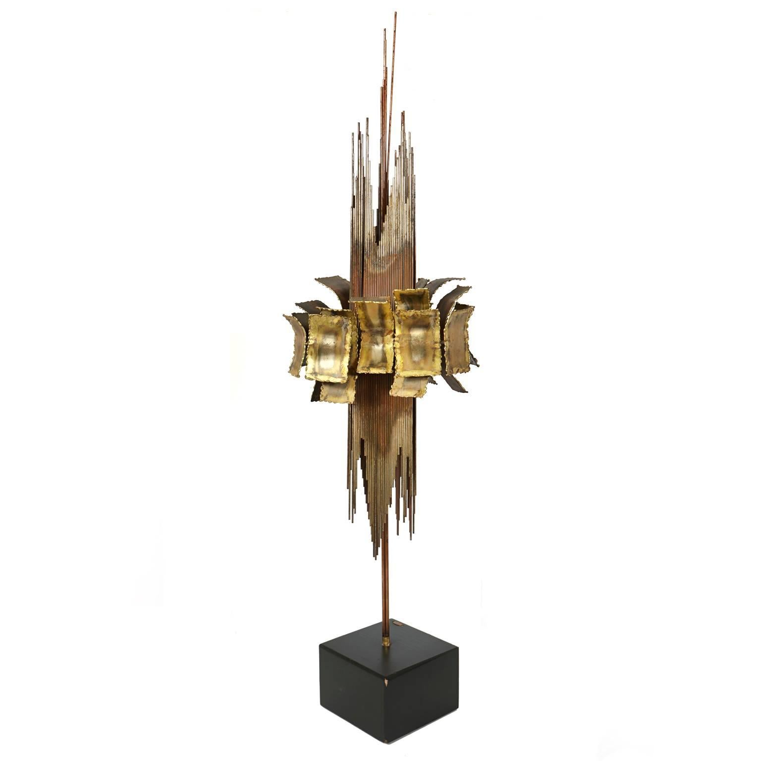 Unique Brutalist brass sculpture by c. Jere signed and dated 1967.
Mounted on blackwood base. Base is 5.5 
