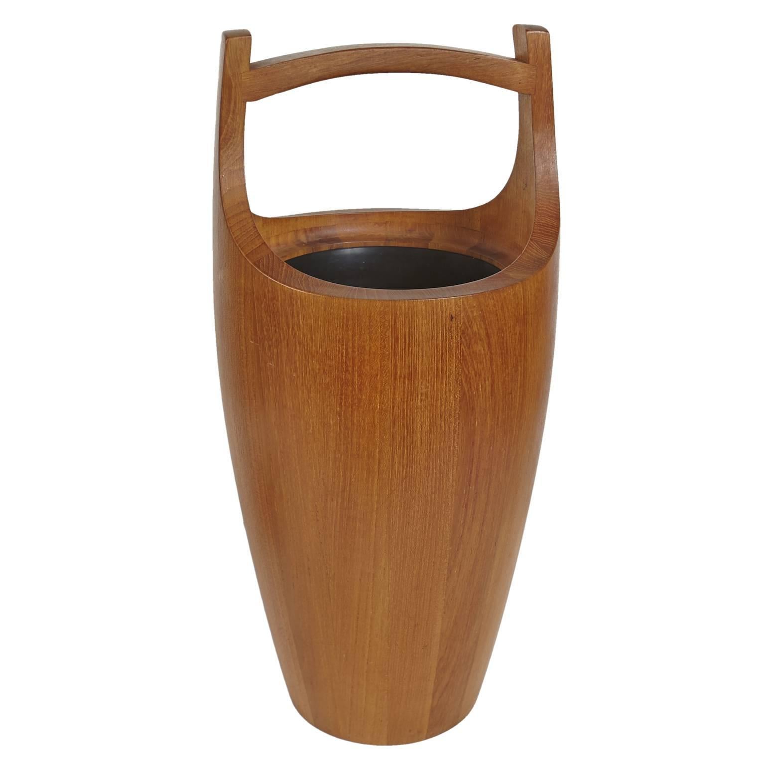 Dansk teak ice bucket by Jens Quistgaard with black liner.
Stamped on bottom, Dansk Design Denmark IHQ.