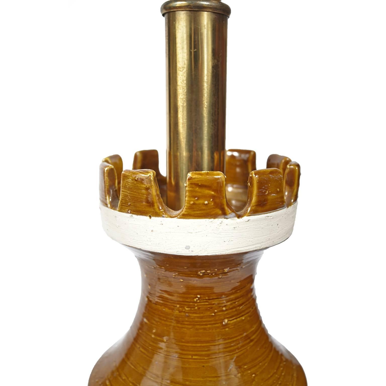 Unique Bitossi, Italian, Mid-Century Modern table lamp. Cream and Carmel colored incised lamp with crown like top. Marked on bottom.