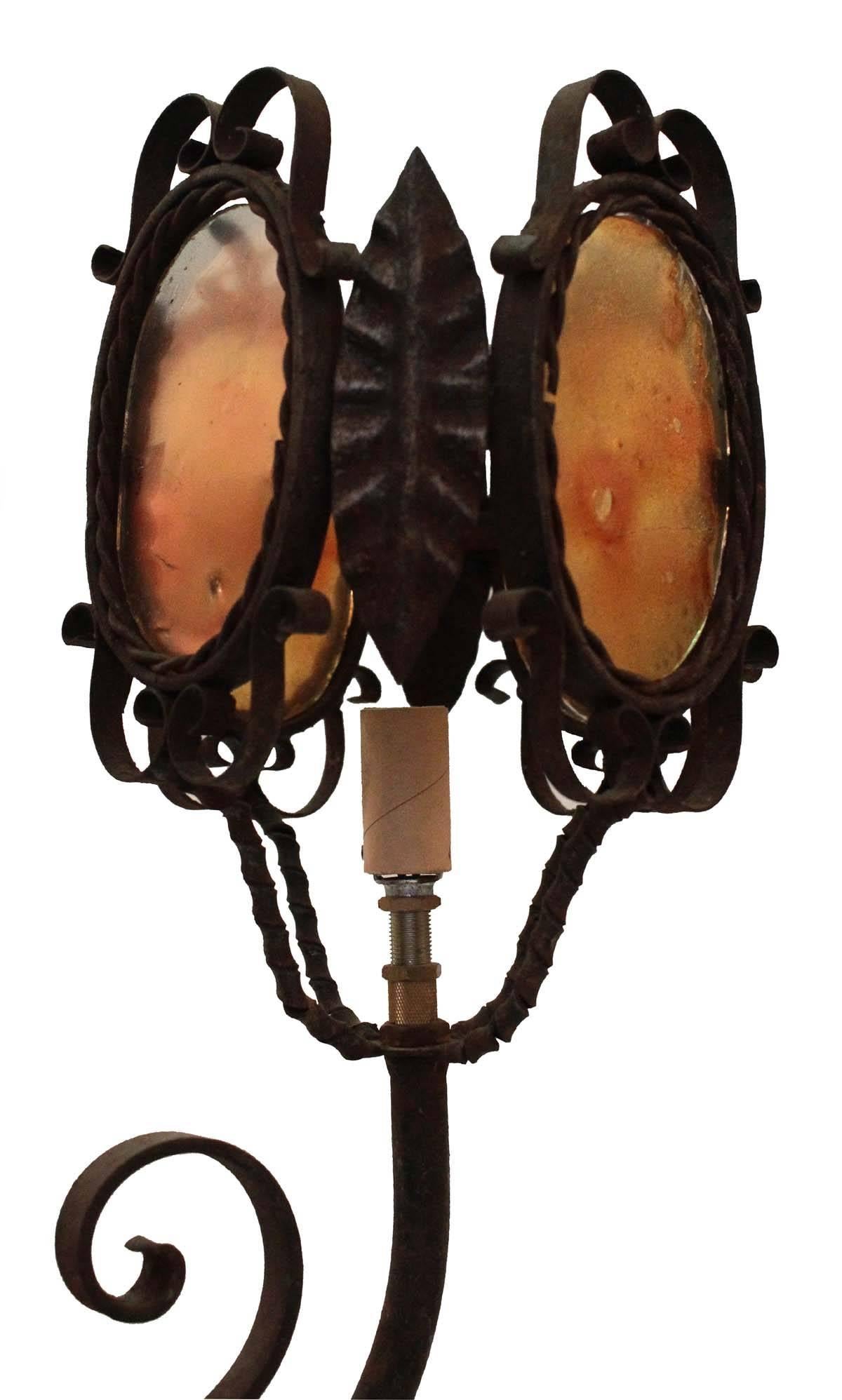 This fixture was converted from a Classic French gas chandelier into a fully functional electrified fixture. The glass is all original hand molded. Iron all handmade. This Chandelier is a beautiful handcrafted fixture.