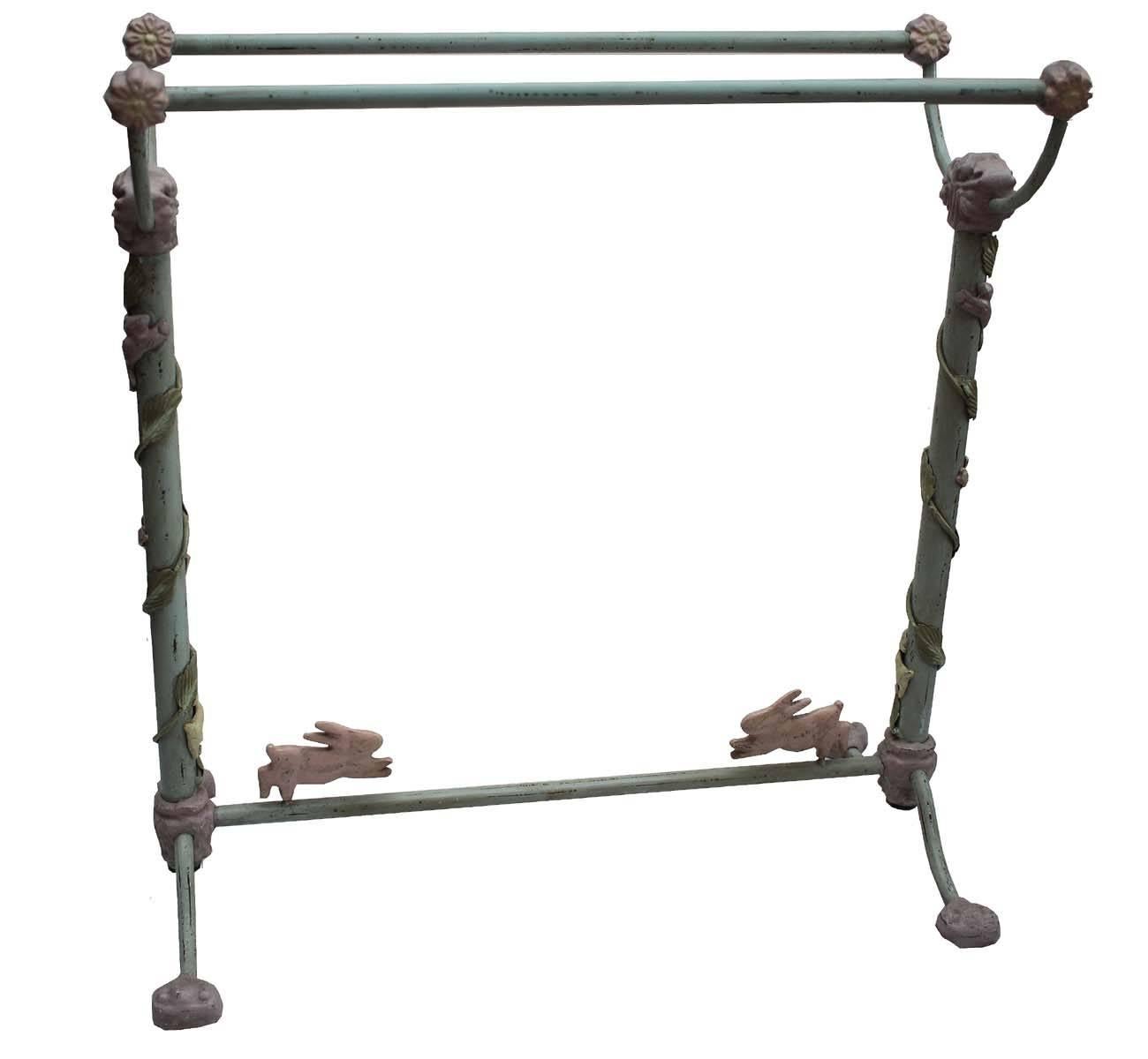 Beautiful, all original metal quilt rack. Amazing color with detailed antique elements, rabbits and flowers. The metal work is quite detailed and like nothing I have sourced in the past. Sturdy and well made this is truly a great find.