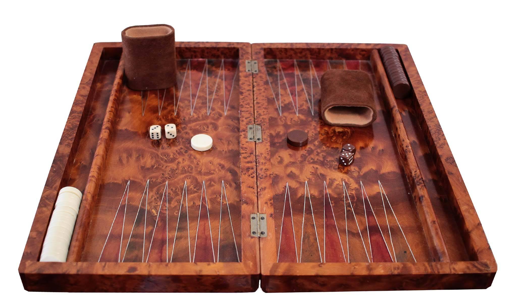 An amazing game board. This is beautiful, amazing the pics speak for themselves. The work that has gone into this game board shows throughout every detail. Backgammon set for the ages.