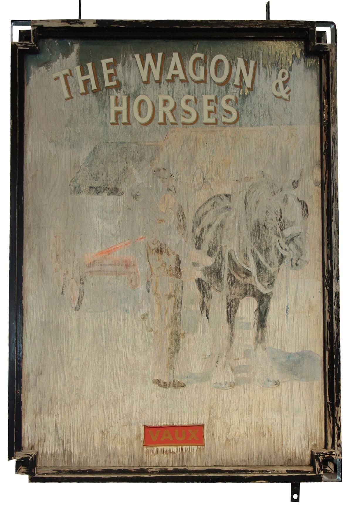 This is a beautiful and unique sign. The colors are fantastic and original. The sign is two sided and has an image of a horse and carriage on it. It was a sign for the Vaux carriage museum in France. Faded more on one side than the other but