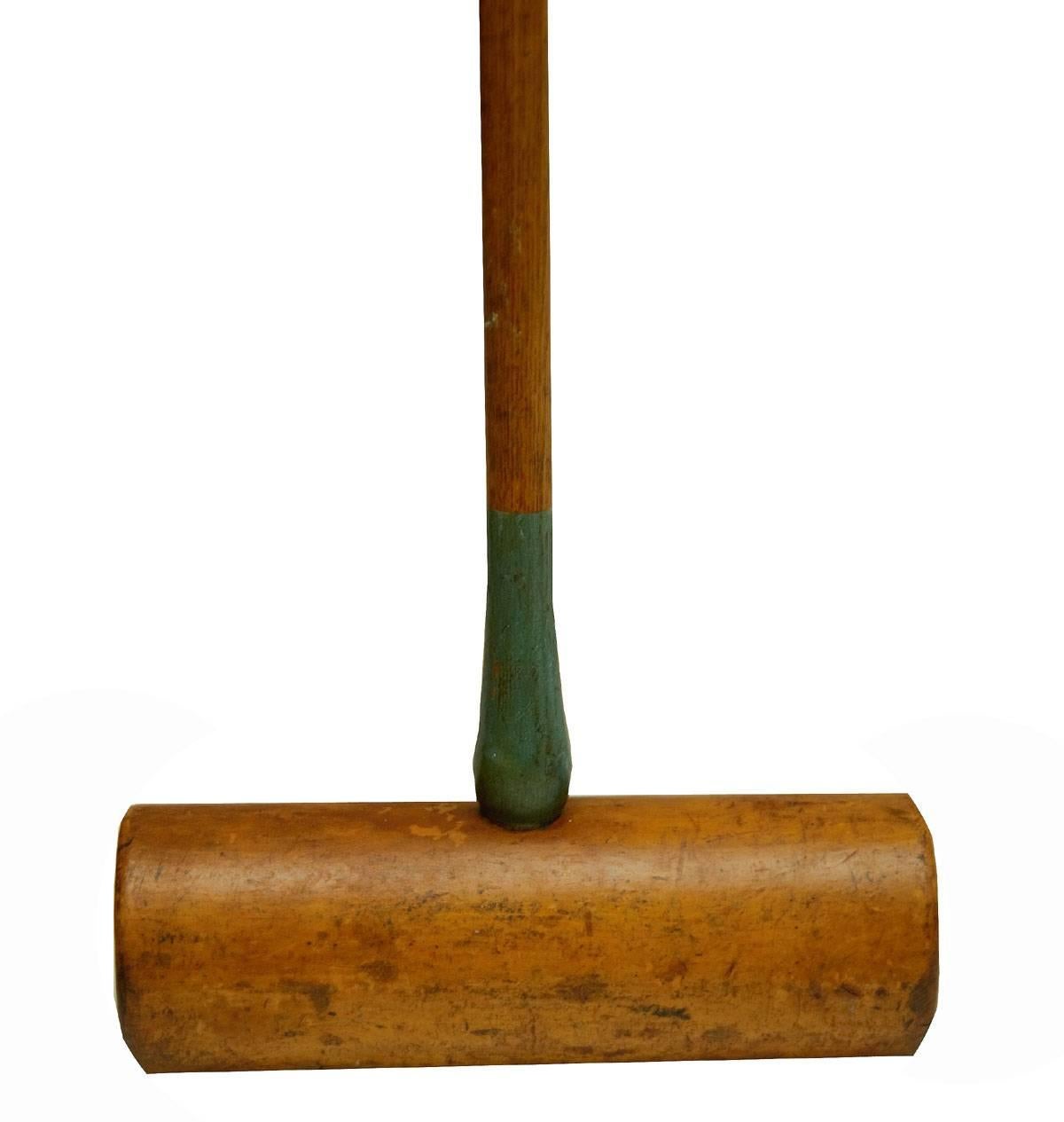 These are original croquet mallets from the turn of the century. They have beautiful patina and are all in fine shape. The colors are noted on the ends closest to the head of the mallet. They are Maple heads  and Hickory shafts. Wonderful decor