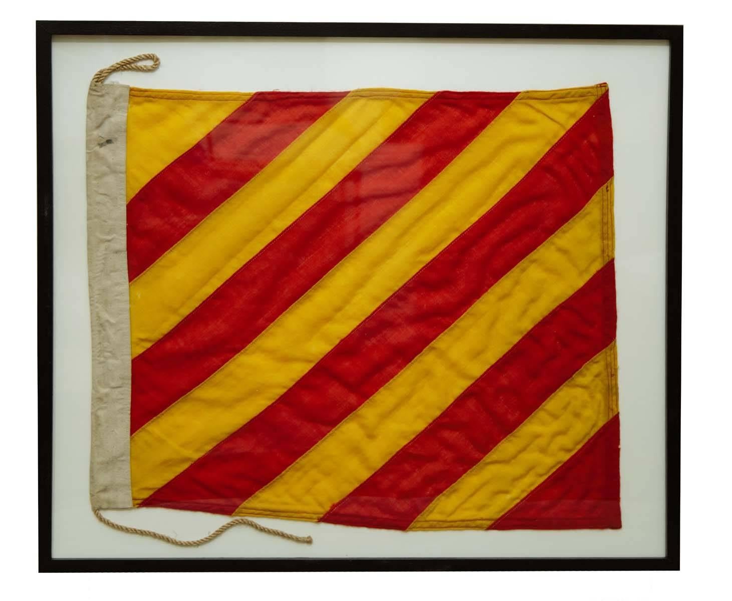 This is a set of original Nautical signal flags from a naval vessel in World War two. The six are mounted and framed in black wood frames with new plexi fronts.  This large set is wonderful wall decor with bright colors and authentic aged texture