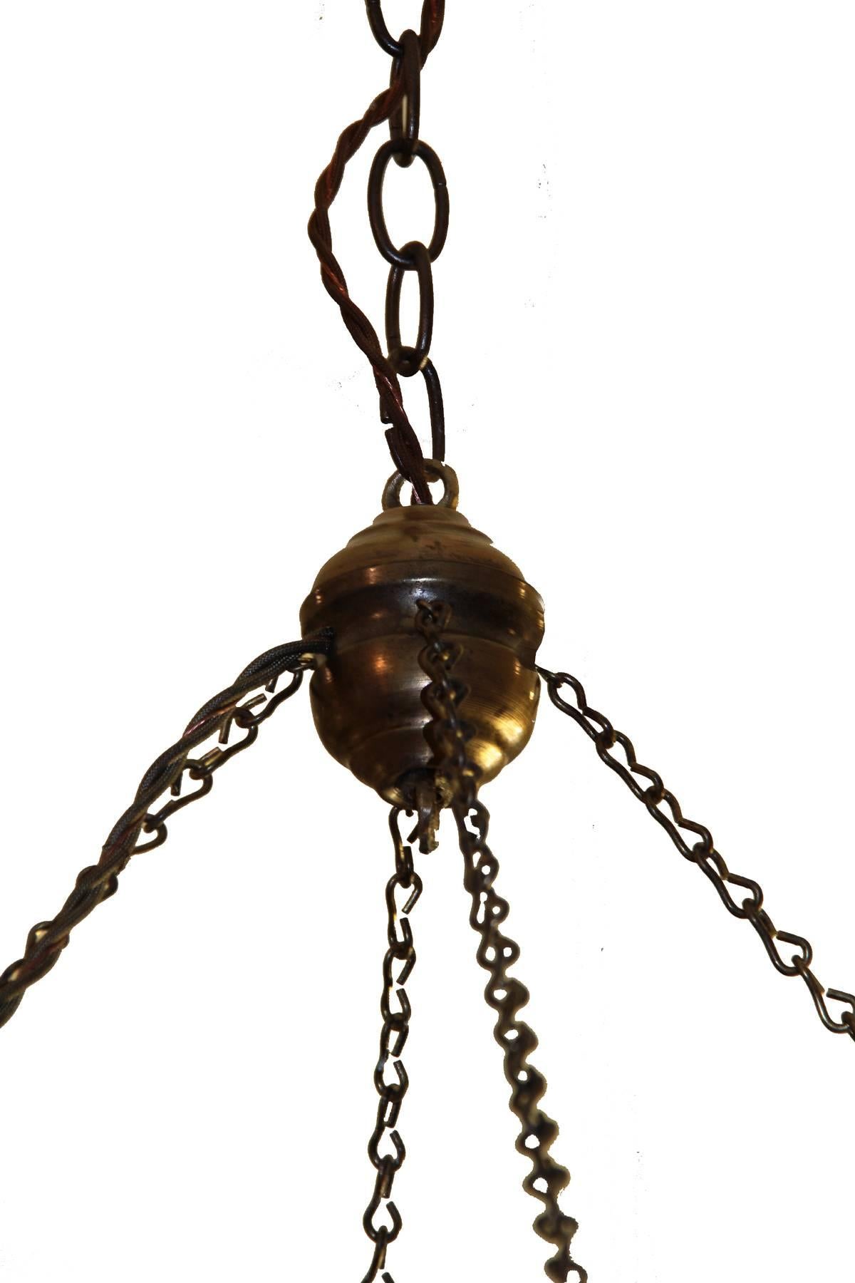 Amazing Egyptian glass chandelier. Eight jar large hand blown clear glass with a brass ring and chain. Amazing look and can be custom-made in multiple sizes and colors. In the world of original lighting you will not find many options of this quality