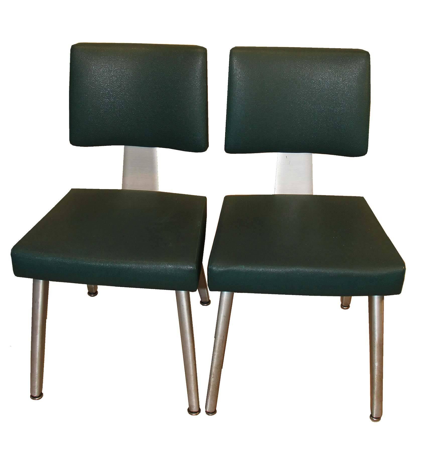 This a pair of good form chairs produced in the 1950s in Youngstown Ohio.
Popular because of the unique style, these chairs were also produced to last. Using durable aluminum frames and timeless fabric choices. Rare to find in a matching pair.