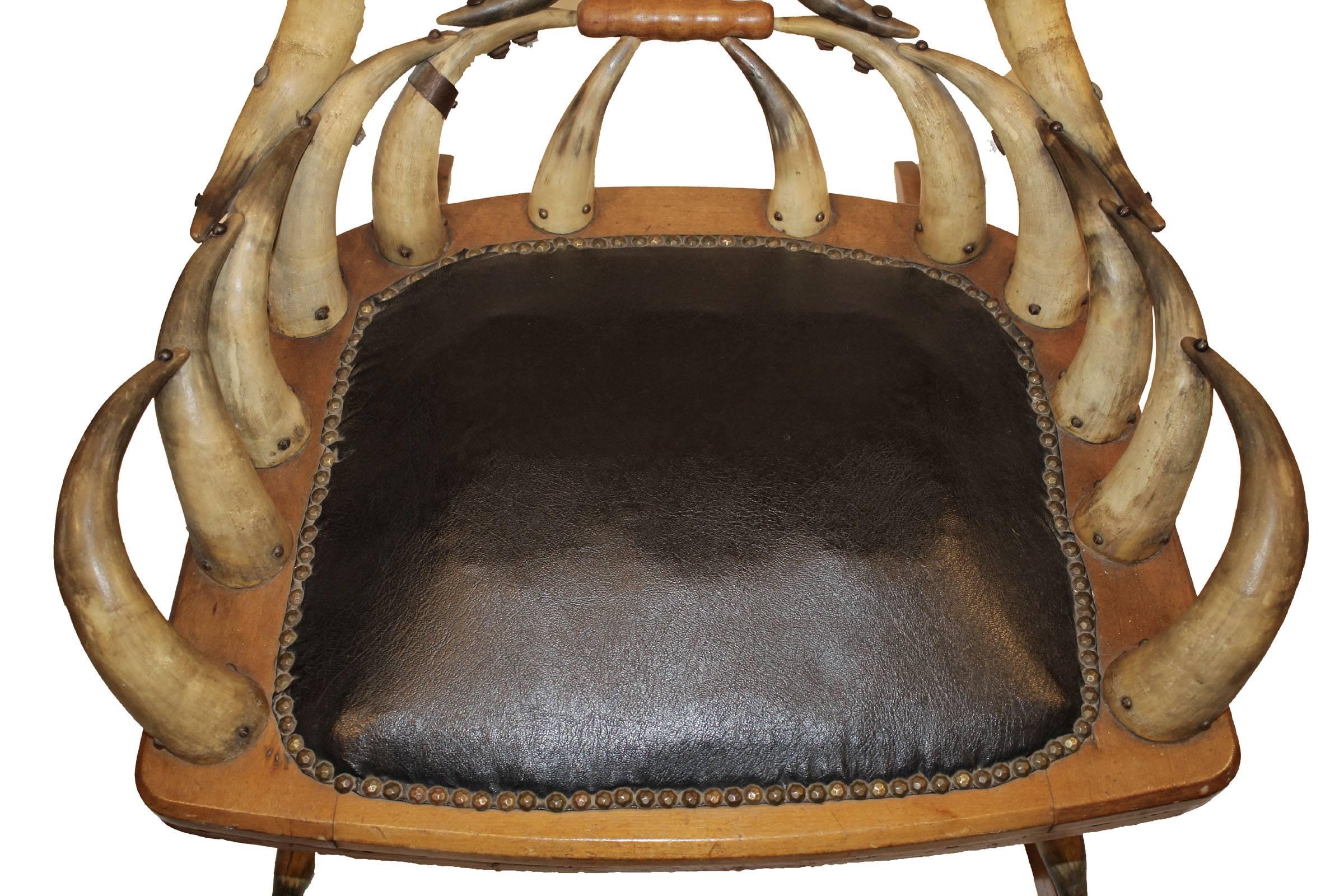 The Horn chair was a popular furniture fixture throughout the Victorian era and is still fashionable with today's designers. Adding unique sizzle to any space this piece is in great condition for its age. Attributed to Wenzel Friedrich this rocker