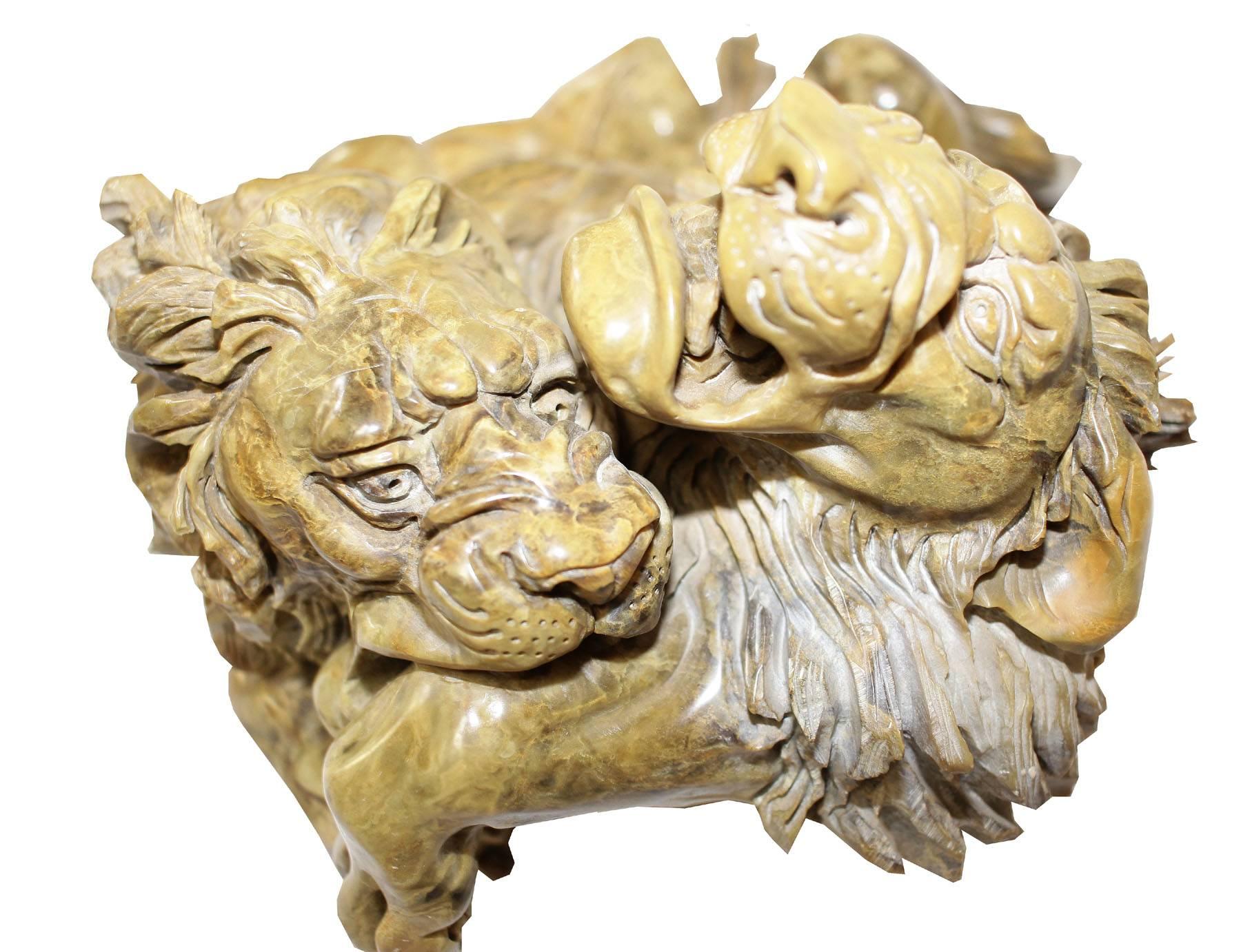 Amazing and dramatic battle of two male lions carved in butter jade. The item is a heavy piece beautiful from every angle. Signed L. Khoza date 6.6.25.
The piece has an amazing presents an amazing conversation piece.