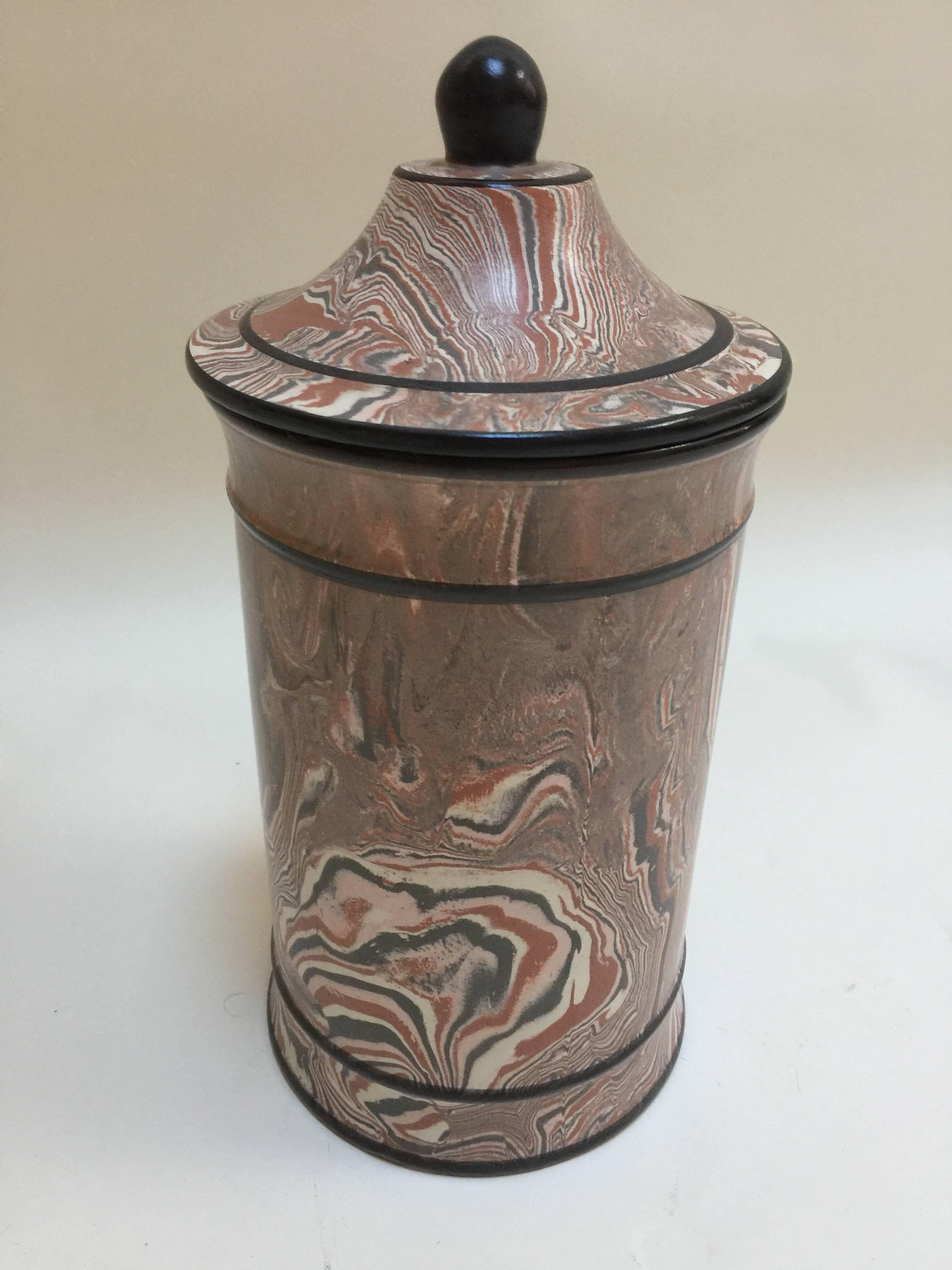 Marbleized pottery cookie jar made in Italy for Neiman Marcus. Gray and pink swirls with black trim, circa 1970s. Excellent condition.