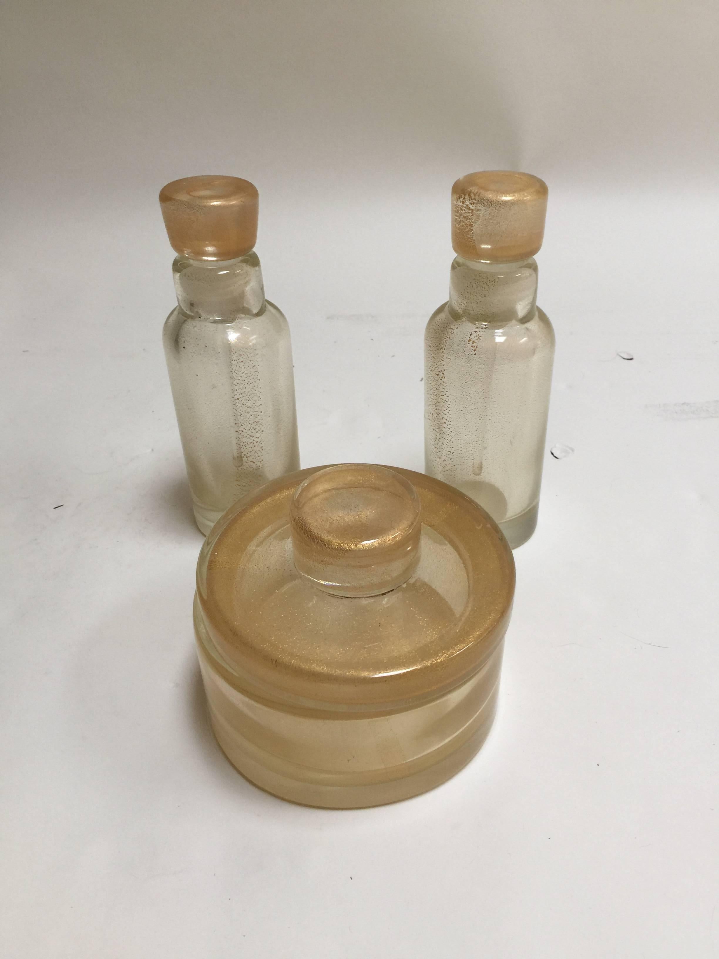 Heavy blown glass powder container and two tall perfume/barber bottles.
Powder jar 5.5 x 4.5