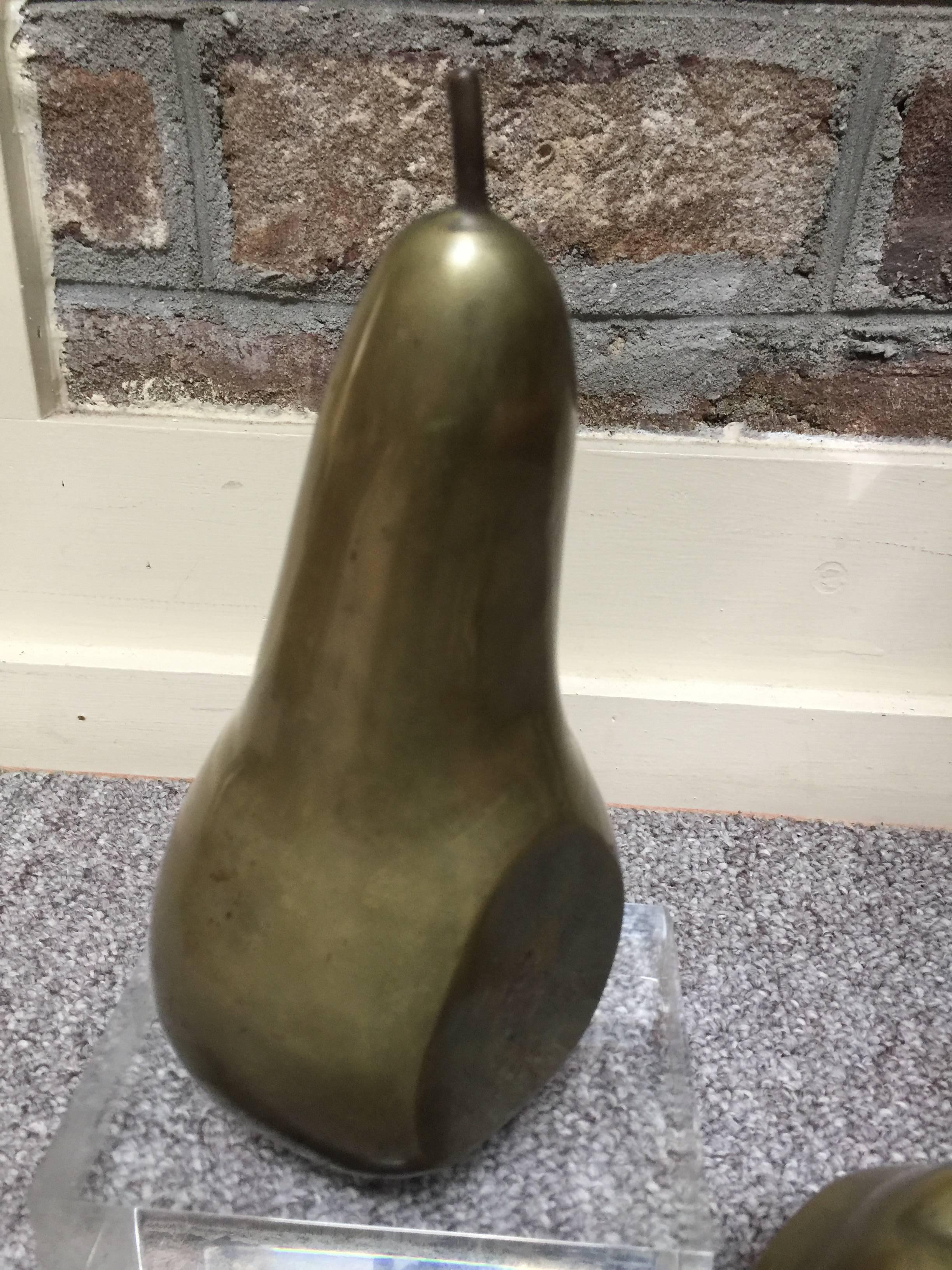 These brass fruit pieces are extremely weighty and marked Made in Italy
Measures: apple is 4 x 4 x 4
pear is 8.5 x 4 x 4.