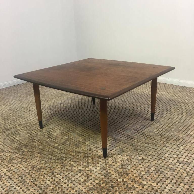 A heavy, modern teak coffee or cocktail table by DUX of Sweden in original condition. Beautiful wood grain and elegant, clean craftsmanship and design. This Classic, simple work would fit seamlessly in almost any setting modern or