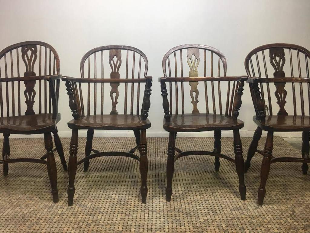 Mid-19th century yew wood Windsor armchairs with desirable U-shaped crinoline stretcher, circa 1850.
Set of four.