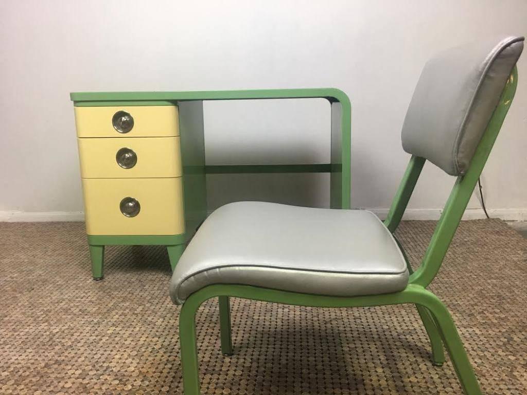A beautifully designed Norman Bel Geddes three-drawer desk and chair for Simmons. Desk and chair are both in original vintage condition and have stunning, apparently hard to find, two-toned coloring. The desk and chair are being sold together