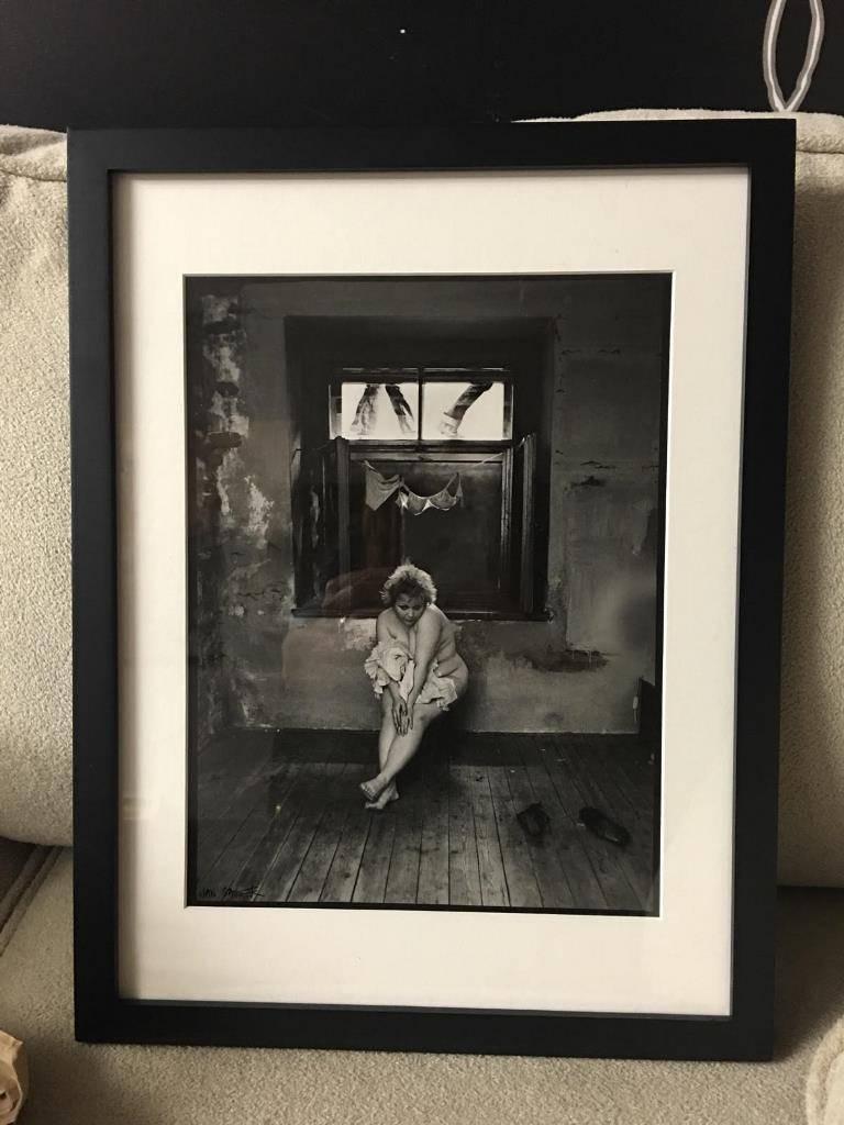A riveting, early, limited edition photographic print by internationally renowned Czechoslovakian art photographer Jan Saudek. This print is signed, dated (1977) and numbered (8 of 25) by the artist as well as matted and framed. Saudek's dream like