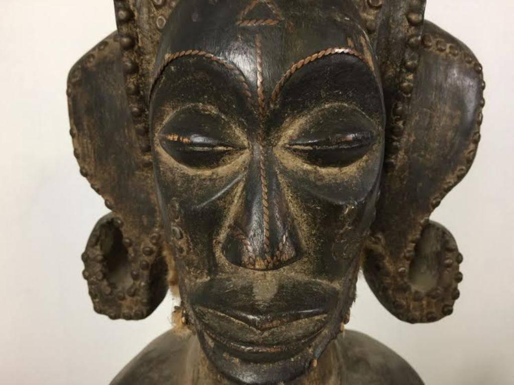 A very unique and original, large carved African ancestor figure. This particular, well carved piece came from an avid collector a fine African art. The piece is solid and made of heavy wood. These figures were placed over or near the tombs of the