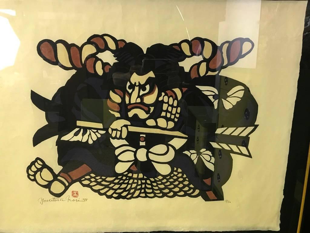 A quite large and engaging fine print by famed Japanese printmaker Yoshitoshi Mori. The print portrays an ancient Samurai, one of Mori's favorite subjects, with an arrowhead in hand. It is stamped, signed, dated (1985) and numbered (12/50) by the