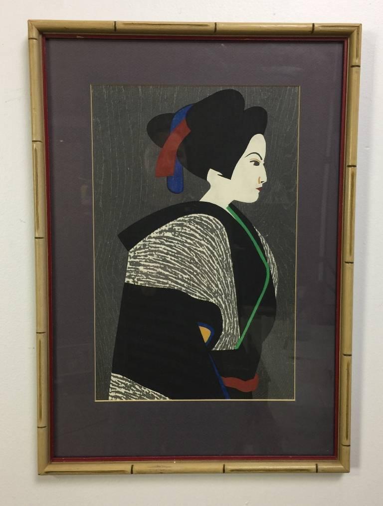 A richly colored and quietly composed portrait or woodblock print by famed Japanese printmaker Kiyoshi Saito. Many consider Saito to be one of the most important, if not the most important, contemporary Japanese printmakers of the 20th century. This