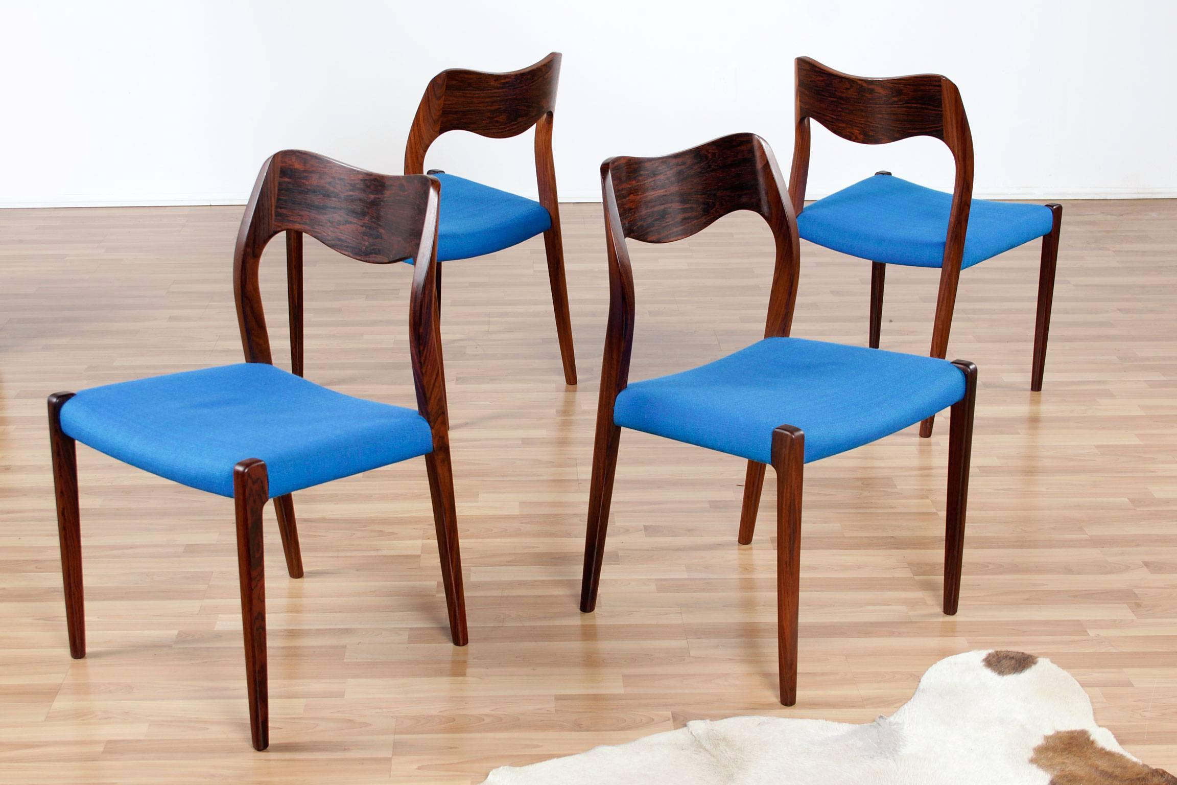 A set of four model 71 rosewood dining chairs, designed by Niels O. Møller and produced by J.L Møllers Møbelfabrik. Made in Denmark, the chairs bear the manufacturer label. This exceptional set of chairs is a ground breaking time capsule find. The
