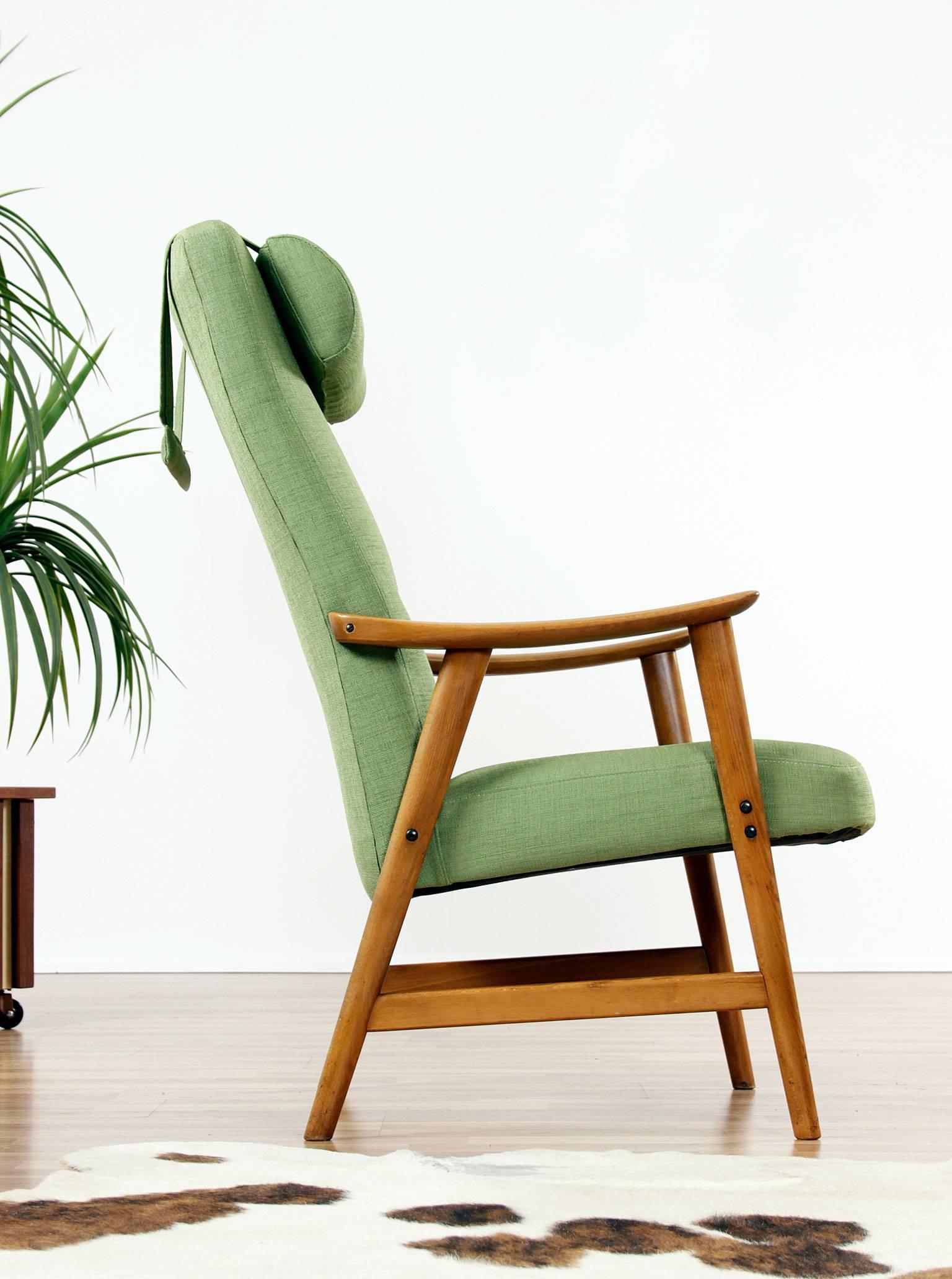 Restored Mid-Century Modern Dokka Mobler armchair. Solid beech wood frame is quintessentially Norwegian. The chair has been restored with new interior support webbing and new green upholstery. Ergonomic design with a contoured back and support