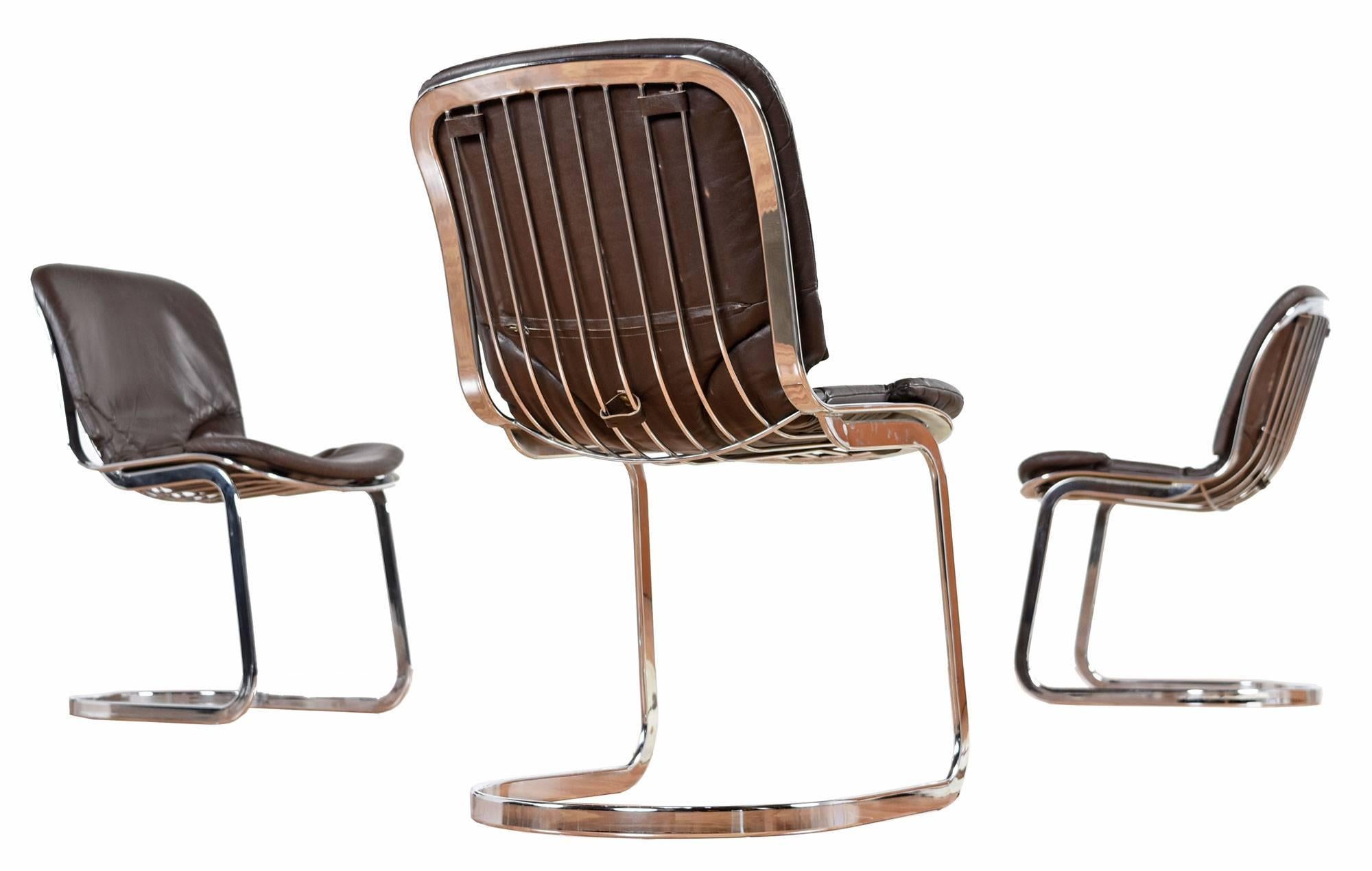 Set of six time capsule quality vintage chrome dining chairs by Cidue. The chairs are Italian made and come complete with their original brown leather cushions. It is not common to find these chairs with the original cushions, they are often sold