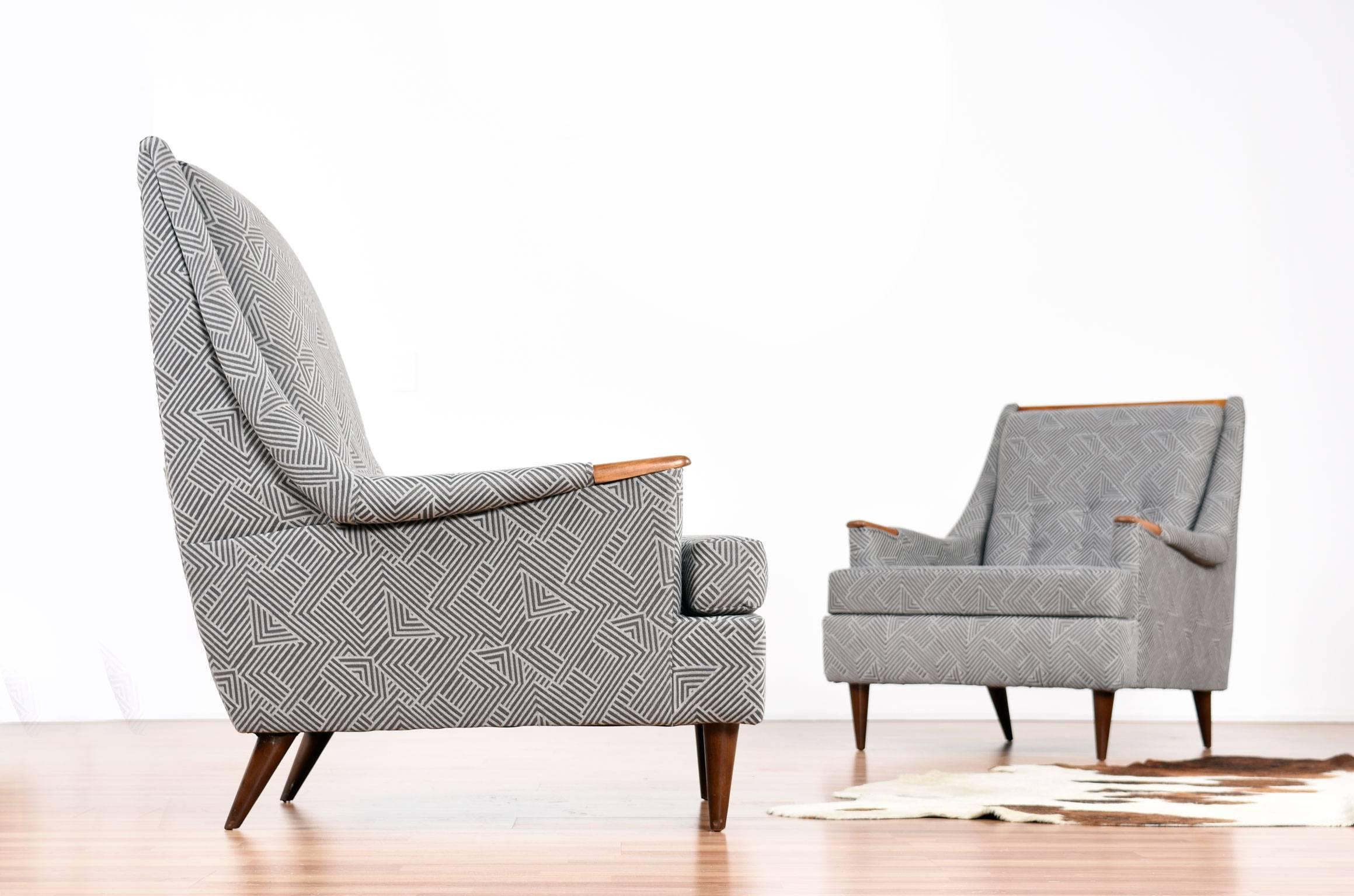 Restored Mid-Century Modern Kroehler "His & Her" lounge chairs by Avant Designs. The chairs feature the original label and are in the style of Adrian Pearsall. This stunning set has been recovered in a two-tone grey graphic print which