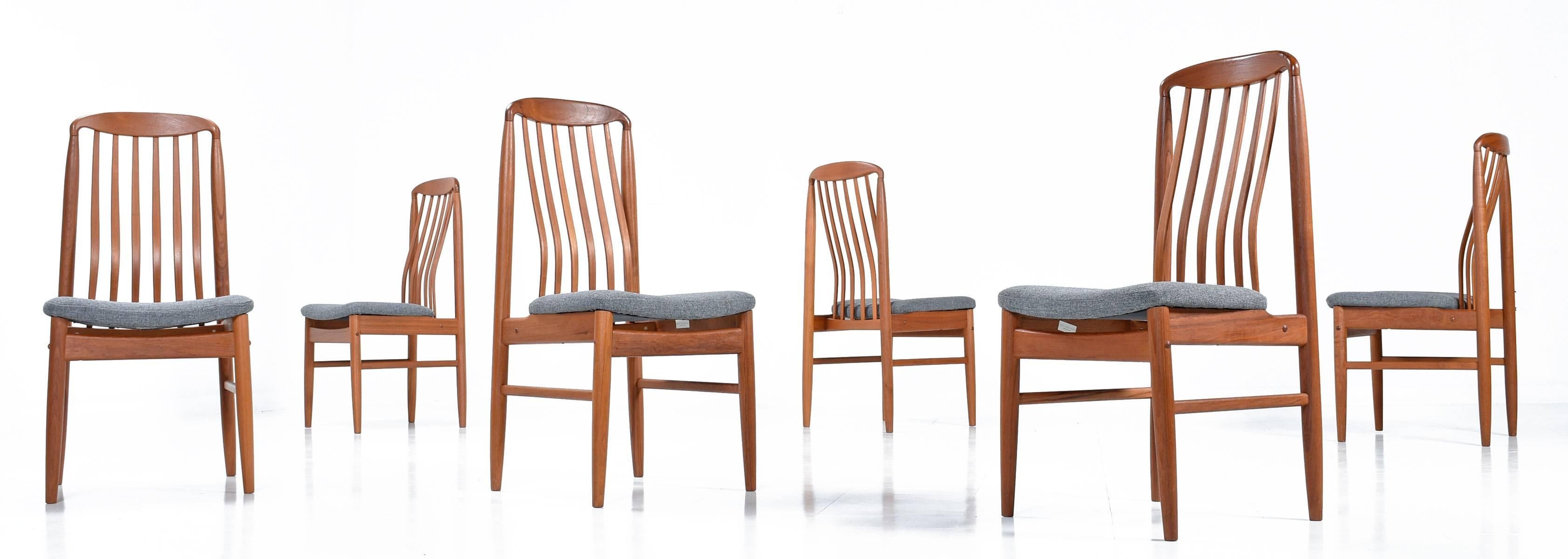 Set of six pre-owned Danish modern style dining chairs by Benny Linden. Crafted in South Asia, made of hand sanded solid teak and European hardware. These chairs are as comfortable as they are beautiful with the contoured backrest supporting the