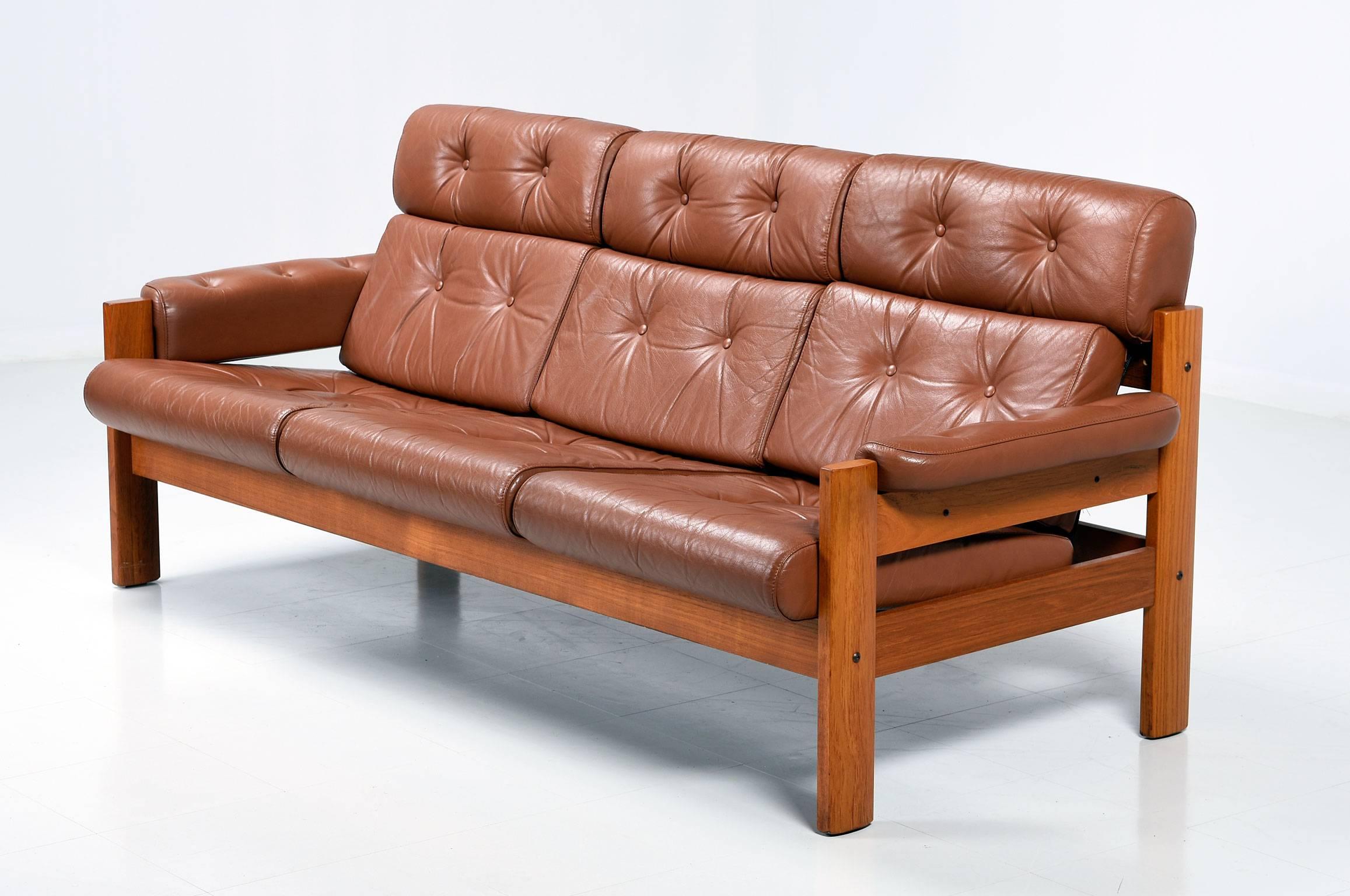 teak leather sofa