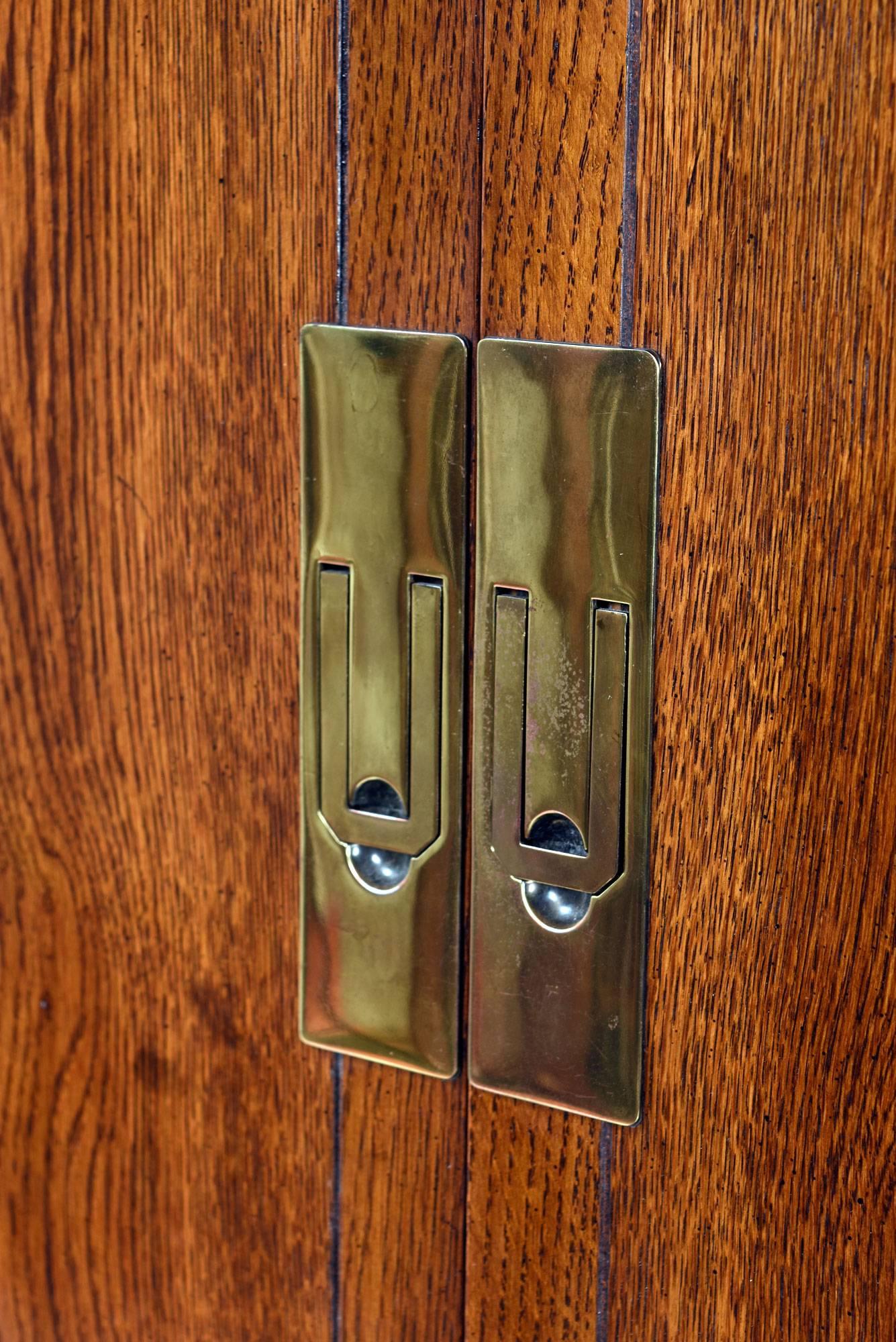 Campaign Style Henredon Pecan Armoire with Brass Pulls In Excellent Condition In Chattanooga, TN