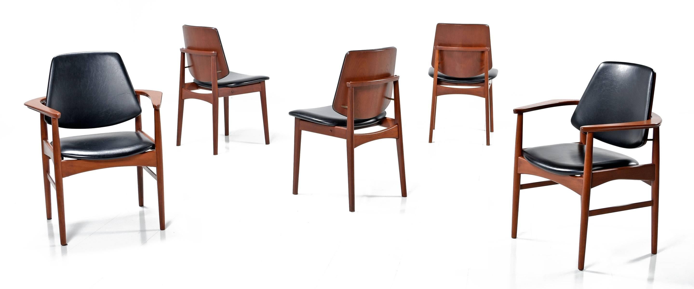 Outstanding set of five Danish teak Hovmand Olsen dining chairs. Superior quality and design by Arne Hovmand-Olsen. Set includes two arm chairs and three armless side chairs. The chairs feature their original black naugahyde upholstery. The solid