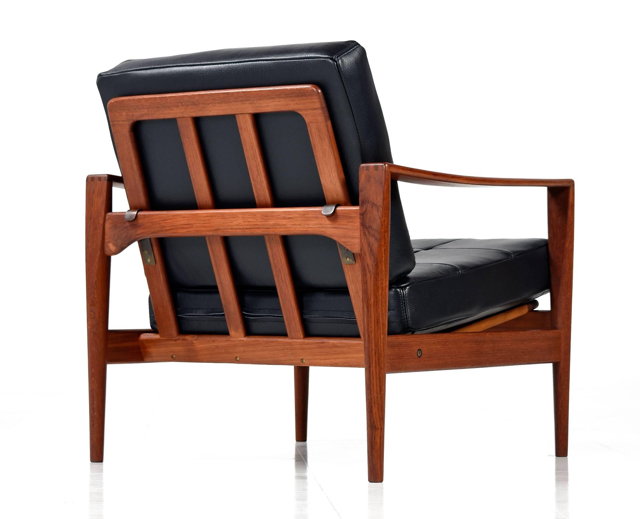 Scandinavian Modern Kai Kristiansen Danish Teak and Black Leather Lounge Chairs Circa 1960's