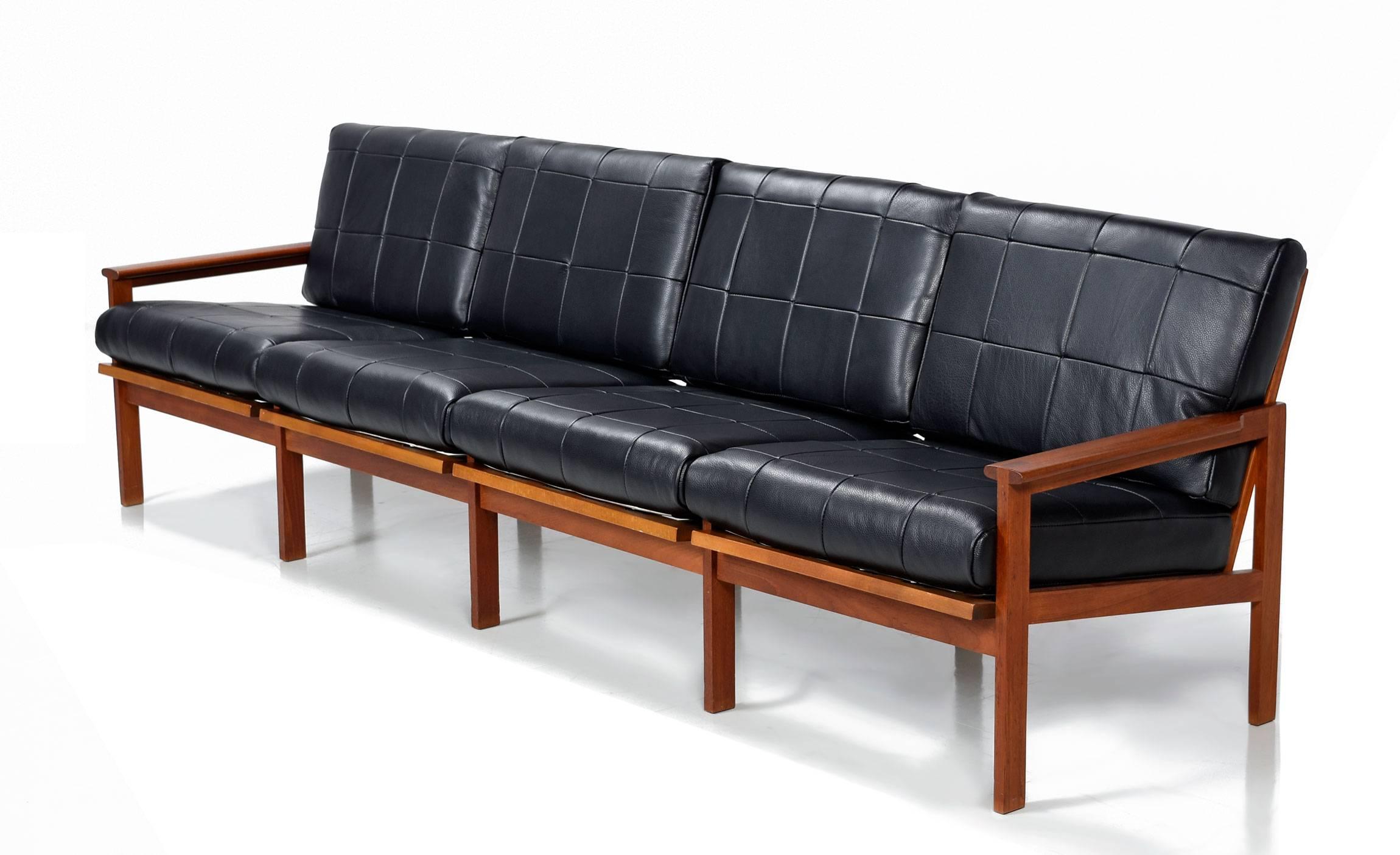 Rare restored Mid-Century Modern sofa by Illum Wikkelso for N. Eilersen. Brilliantly designed with each section of the sofa being an individual module. This system allows one to customize the sofa length. Add or remove sections to make a single