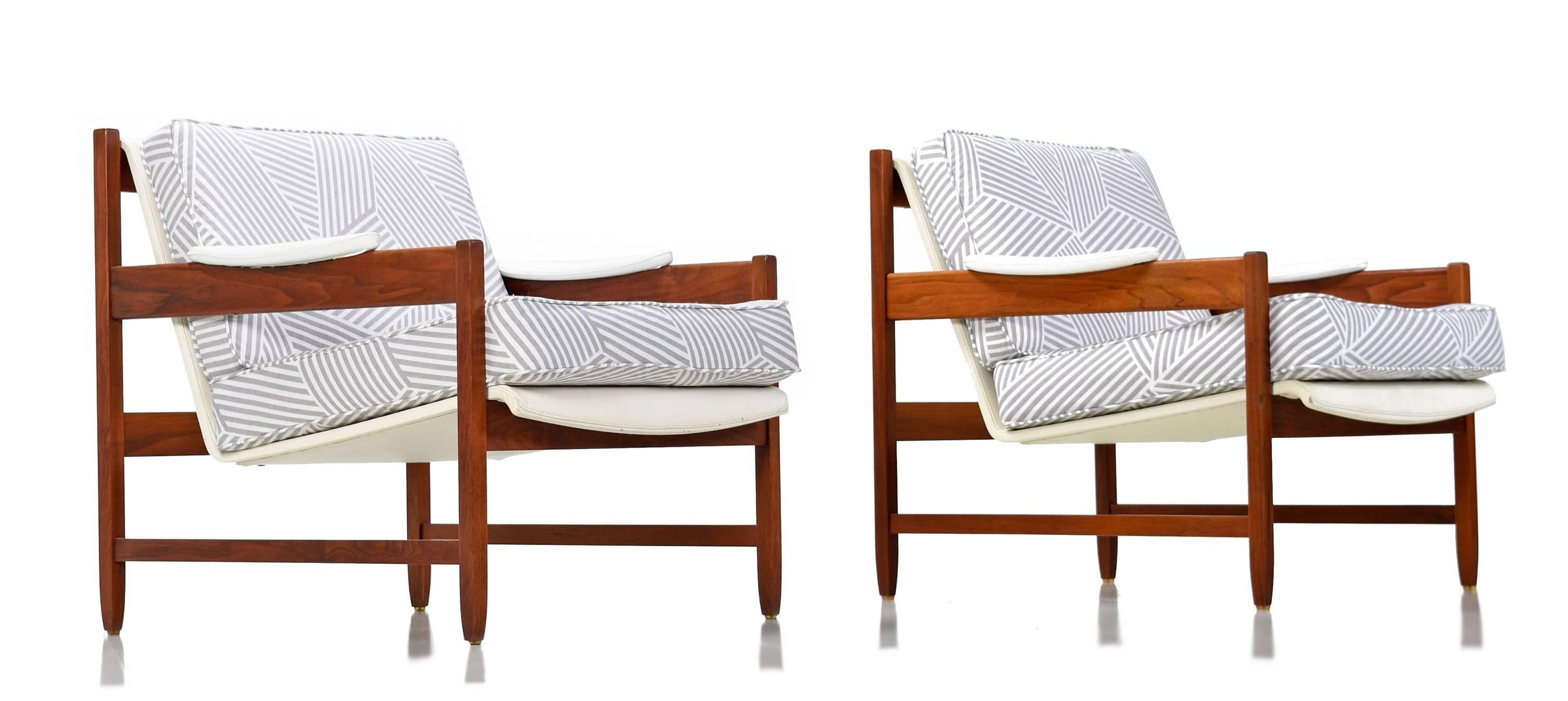 Tampa Bay locals will appreciate a bit of home town history with this pair of Mid-Century Modern arm chairs by Galloway's of Tampa. The upscale modern furniture store operated for the better part of the 20th century and produced some stunning