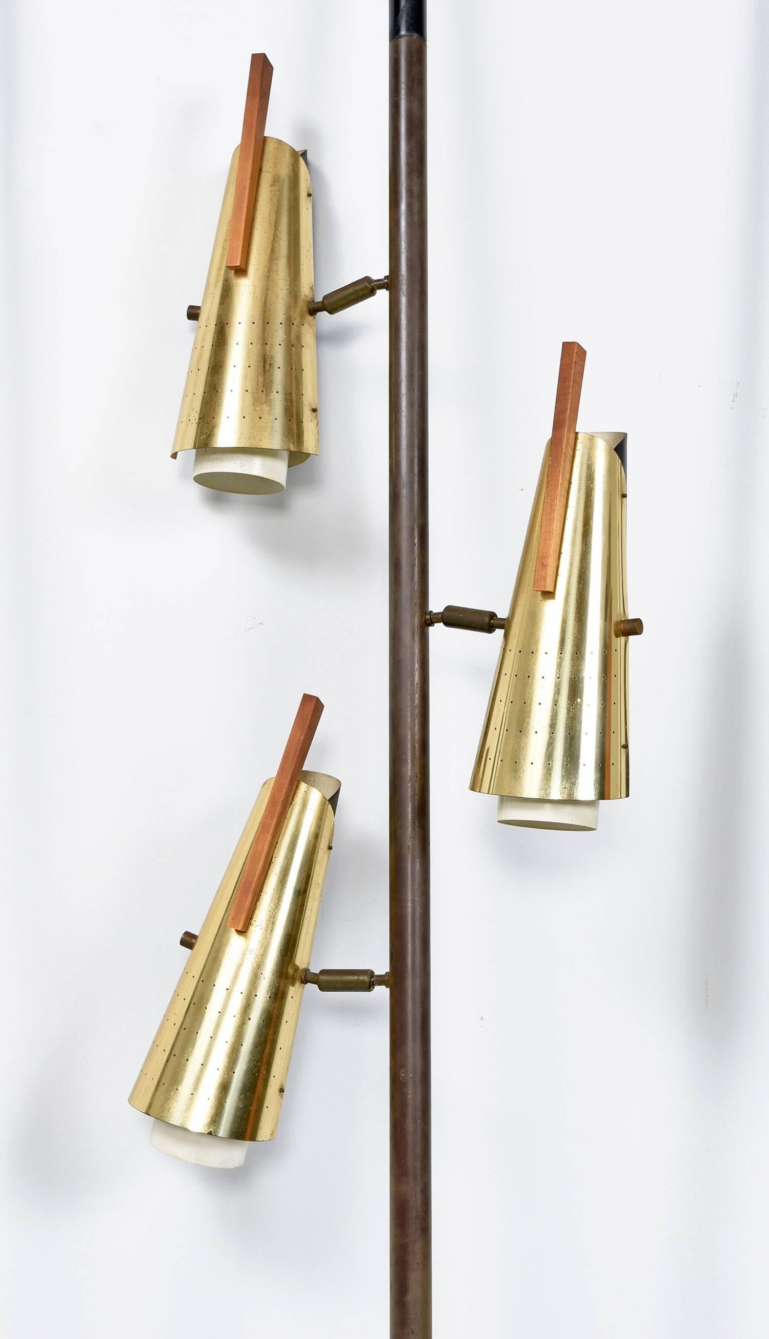 Set of five Mid-Century Modern pole tension pole lamps by Stiffel, 1950s. This atomic style room divider features five individual tension poles, one with a set of three adjustable lamps. Each of these poles can be placed as you'd like to create the