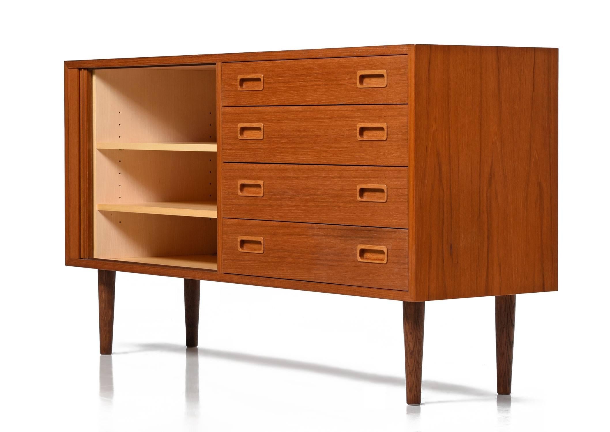 Mid-Century Modern teak credenza by Poul Hundevad. Credenza bears the makers mark on the back left corner and is stamped 