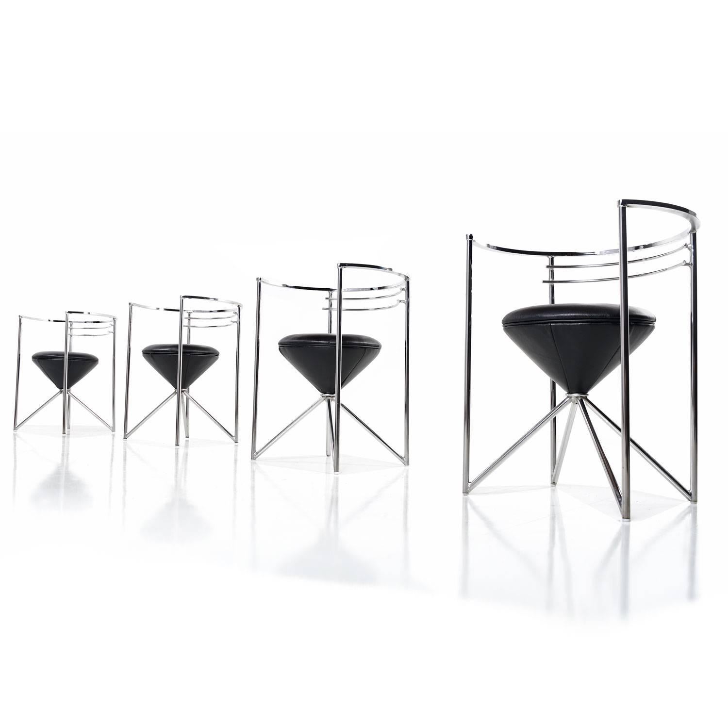 Made by Minson of California, this chrome dining set is the perfect mix of Mid-Century Modern and Art Deco design.  Straight architectural construction intermingles with curved lines to create a beautiful balance of function and form.  

-- Brand