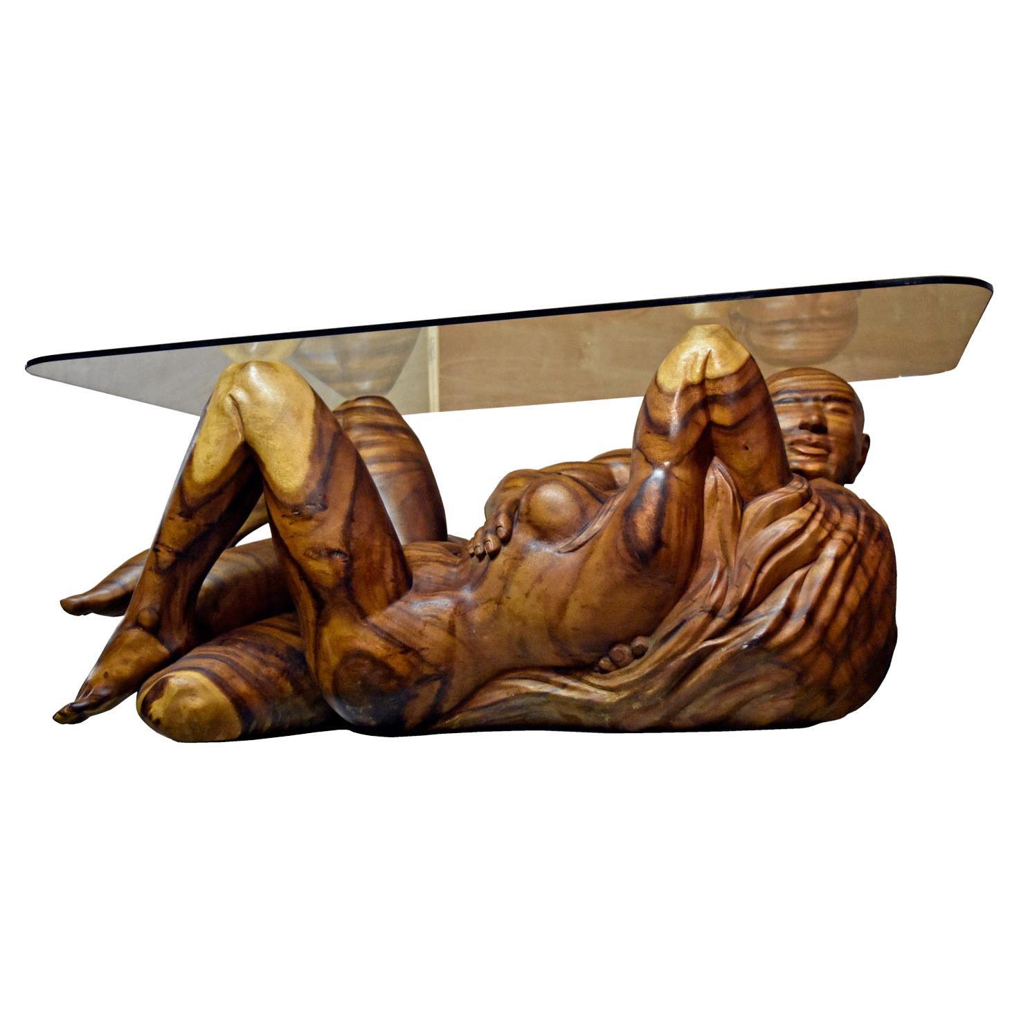 Masterfully hand carved from what must have been a colossal solid piece of monkey pod hardwood. This nude figural sculpture weighs around 250 lbs. Although our photos are an adequate representation, the authentic real life presentation of this work