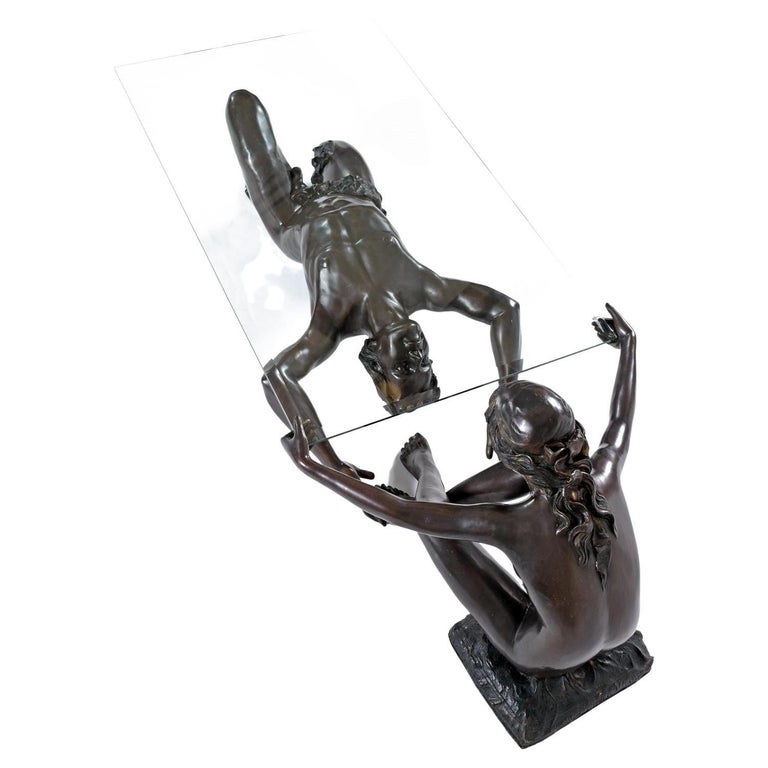 Beautifully patinated, absolutely exquisite Art Nouveau figural bronze coffee table by C. Conndray. This coffee table is a perfect example of functional art. The three-piece coffee table features a male and female companion playfully engaging while