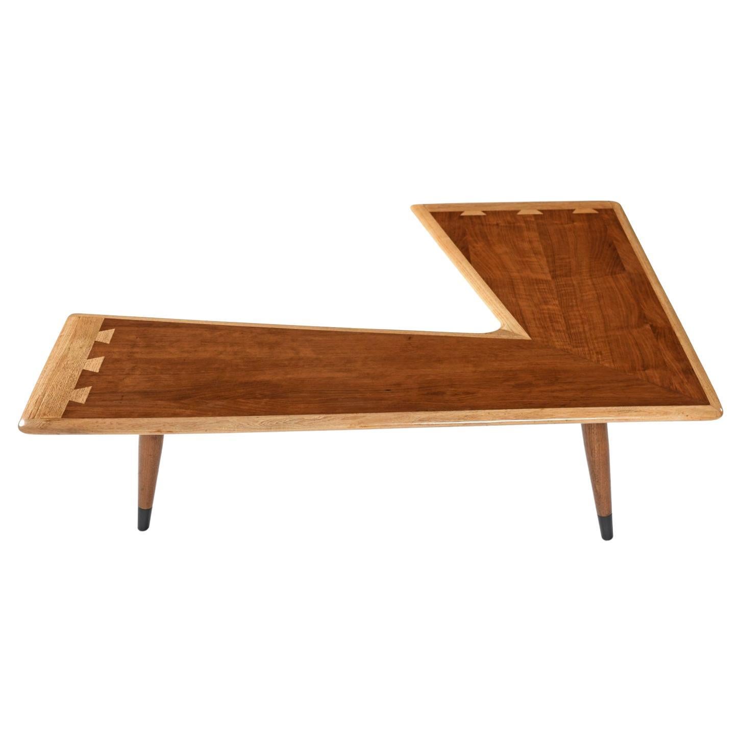 This boomerang coffee table is one of the more illusive and sought after models from the ubiquitous Acclaim line by Lane. The FMV restoration team brought this neglected orphan back to life and the transformation was significant. The loose legs were