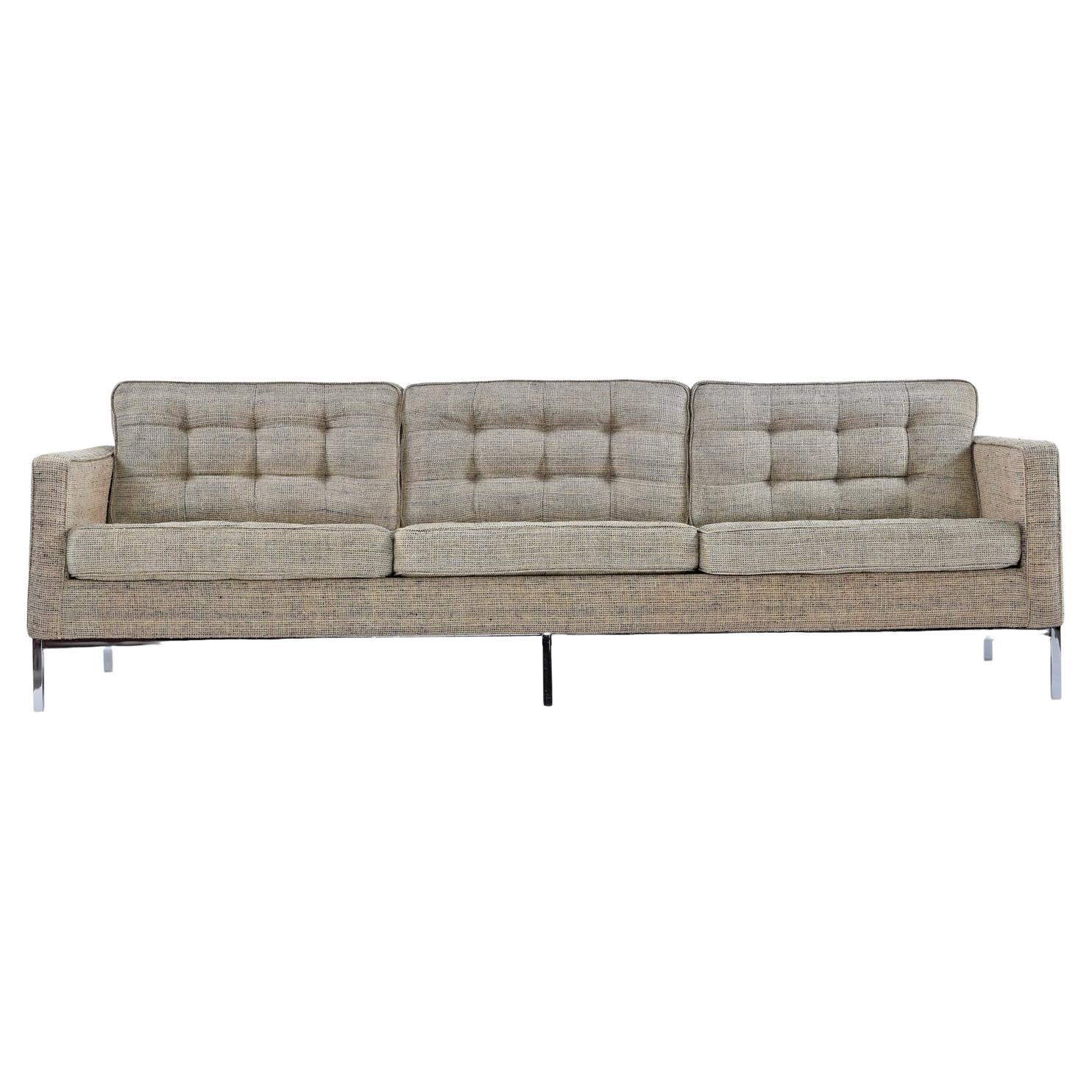 Vintage original Florence Knoll sofa in heather grey tweed fabric. Although unsigned or tagged, this is 100% knoll, and most likely from the 1980's. Purchased from an estate along with matching chair and Herman Miller Walnut Conference Table. The