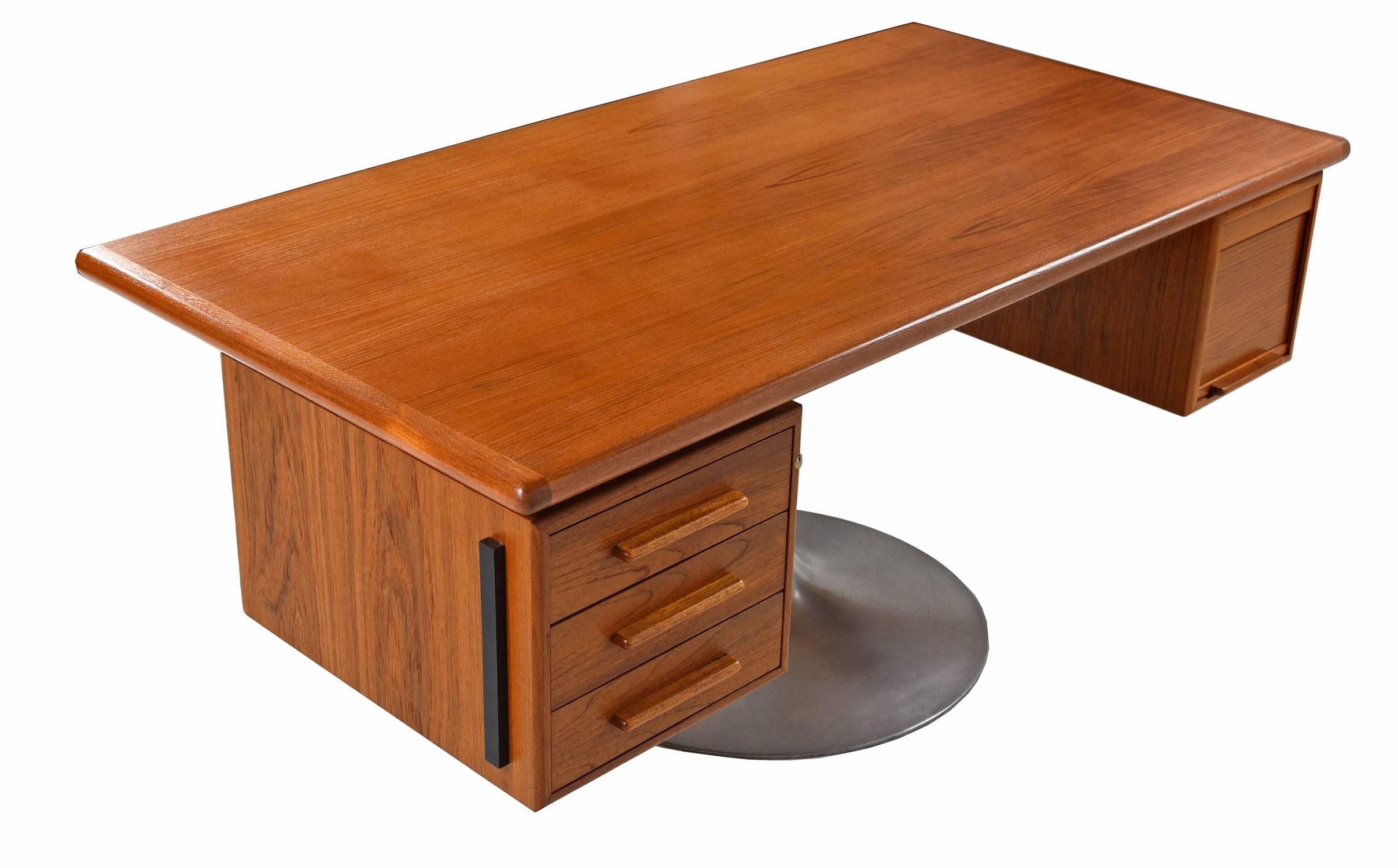 Absolutely stunning bespoke teak executive desk on a large pedestal base. This one-of-a-kind piece was created at furnish me vintage. The desk was fabricated from salvaged vintage parts including components from a modular Danish teak office system